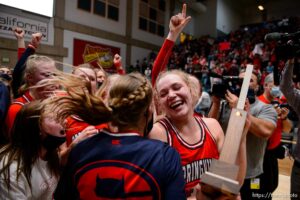 (Trent Nelson  |  The Salt Lake Tribune) Springville's Lauryn Deede celebrates after hitting a buzzer-beater to defeat Farmington High School in the 5A girls basketball state championship game, in Taylorsville on Saturday, March 6, 2021.