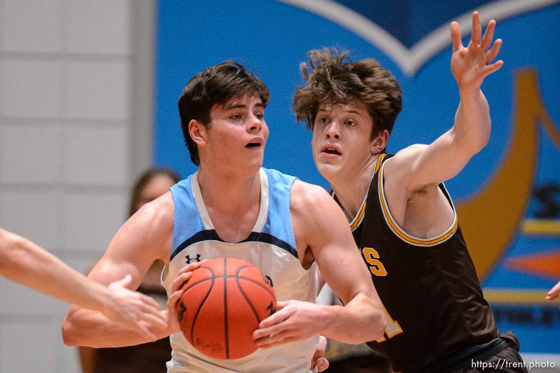 (Trent Nelson  |  The Salt Lake Tribune) Westlake's Noah McCord and Davis's Henry Ihrig as Westlake faces Davis High School in the 6A boys basketball state championship game, in Taylorsville on Saturday, March 6, 2021.