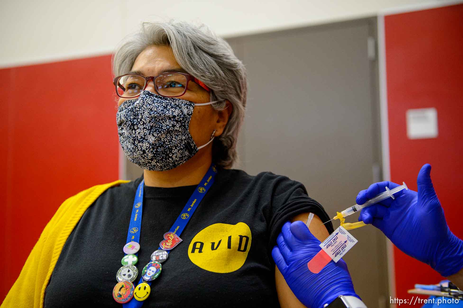 (Trent Nelson  |  The Salt Lake Tribune) Milagros Vasquez is vaccinated as teachers and staff of the Canyons School District received their second shots of the Moderna vaccine at Mount Jordan Middle School in Sandy on Thursday, March 11, 2021.