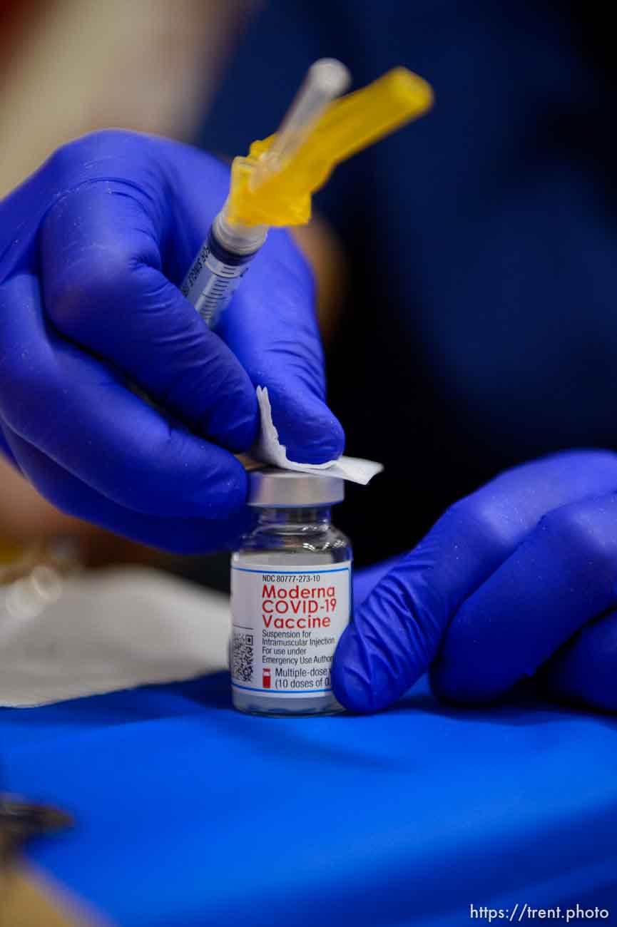 (Trent Nelson  |  The Salt Lake Tribune) A vial of vaccine as teachers and staff of the Canyons School District received their second shots of the Moderna vaccine at Mount Jordan Middle School in Sandy on Thursday, March 11, 2021.