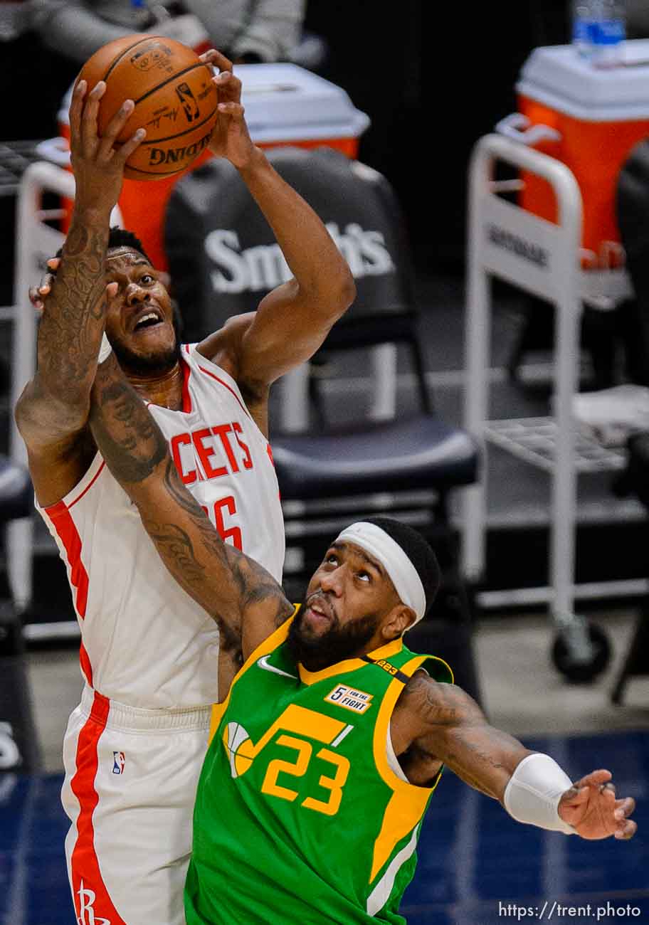 (Trent Nelson  |  The Salt Lake Tribune) Houston Rockets center Justin Patton (26) and Utah Jazz forward Royce O'Neale (23) reach for the ball as the Utah Jazz host the Houston Rockets, NBA basketball in Salt Lake City on Friday, March 12, 2021.