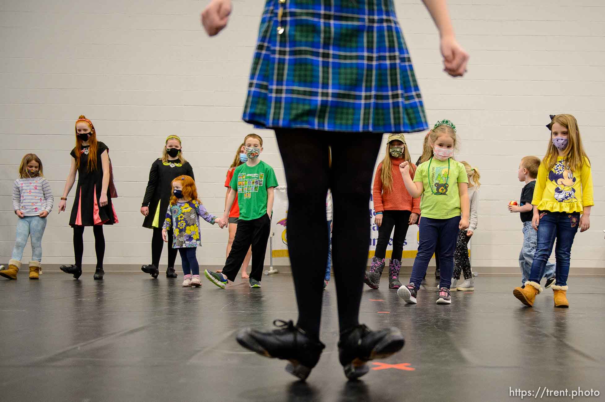 (Trent Nelson  |  The Salt Lake Tribune) Gloria Salisbury leads an impromptu Irish dance lesson as the An Dragan Ceilteach Irish Dancers hold an event at Advantage Arts Academy in Herriman on Saturday, March 13, 2021.