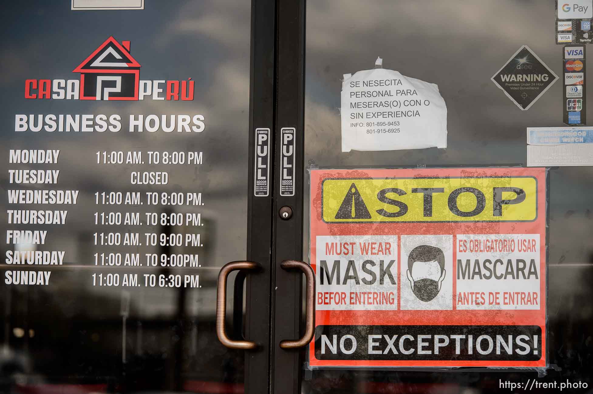 (Trent Nelson  |  The Salt Lake Tribune) A sign calls for mask-wearing at Casa Peru in West Valley City on Tuesday, March 16, 2021.