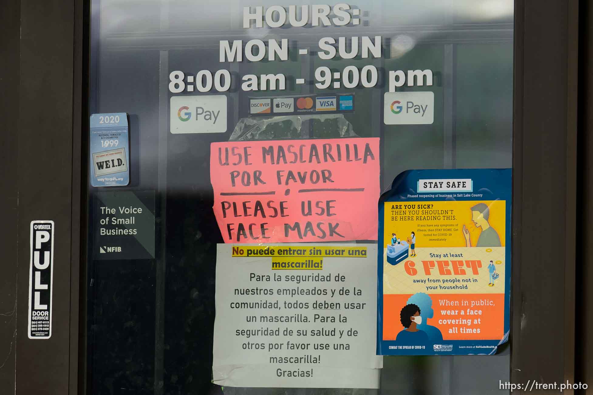 (Trent Nelson  |  The Salt Lake Tribune) Signs indicating masks are required at a store in Salt Lake City on Tuesday, March 16, 2021.