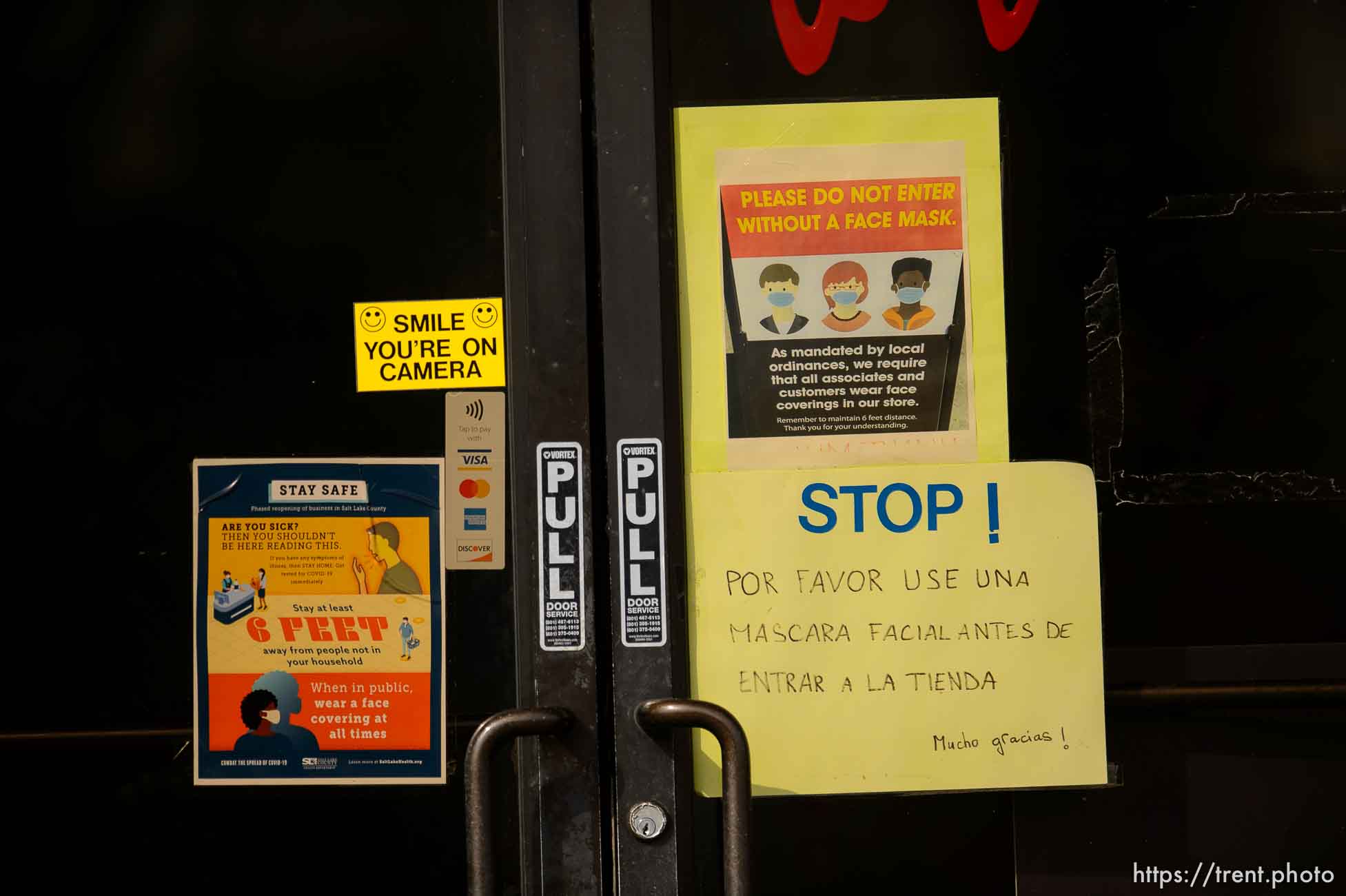 (Trent Nelson  |  The Salt Lake Tribune) Signs indicating masks are required at a store in West Valley City on Tuesday, March 16, 2021.