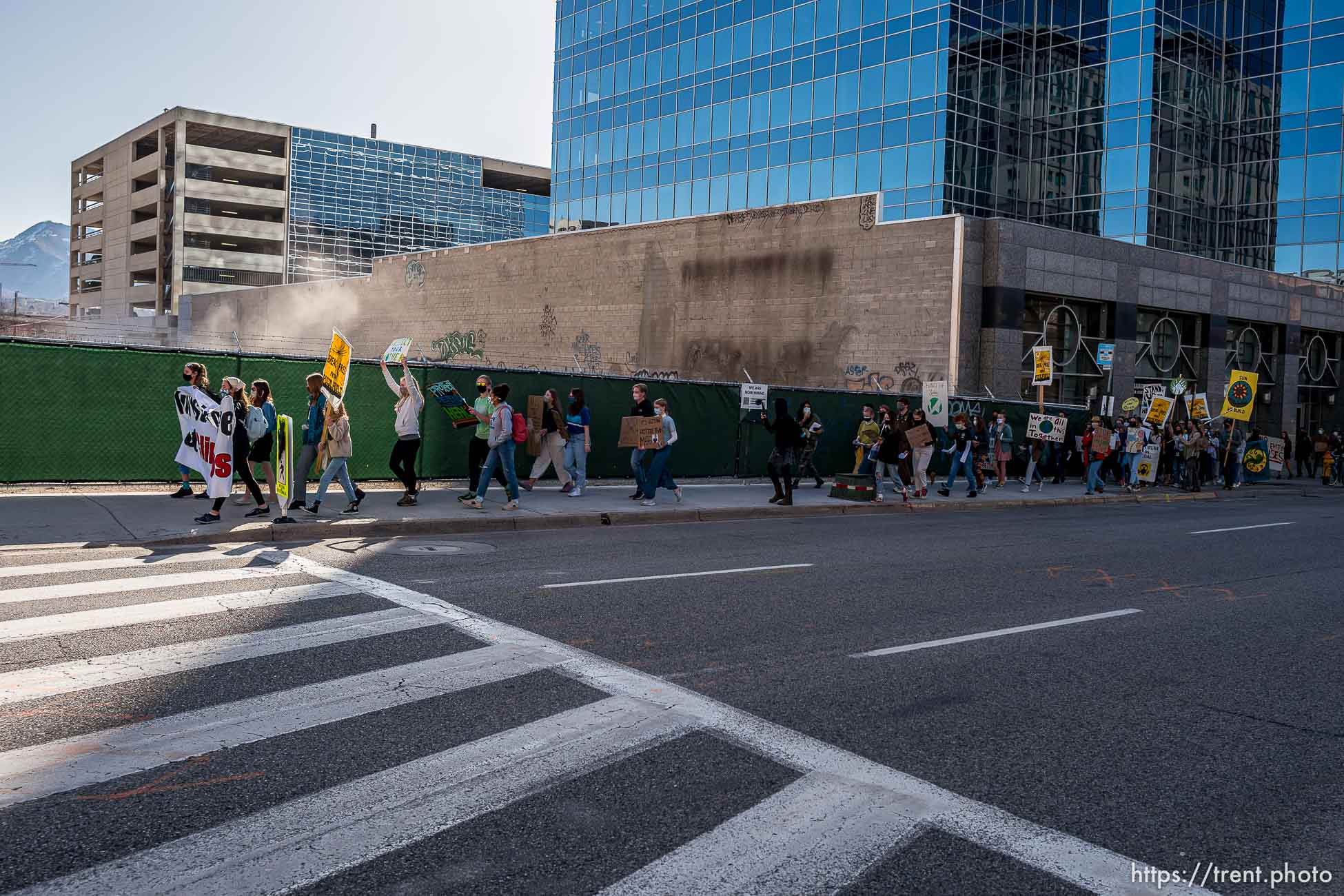 (Trent Nelson  |  The Salt Lake Tribune) Students march to the state Capitol in Salt Lake City to protest inaction on the climate crisis on Friday, March 19, 2021.