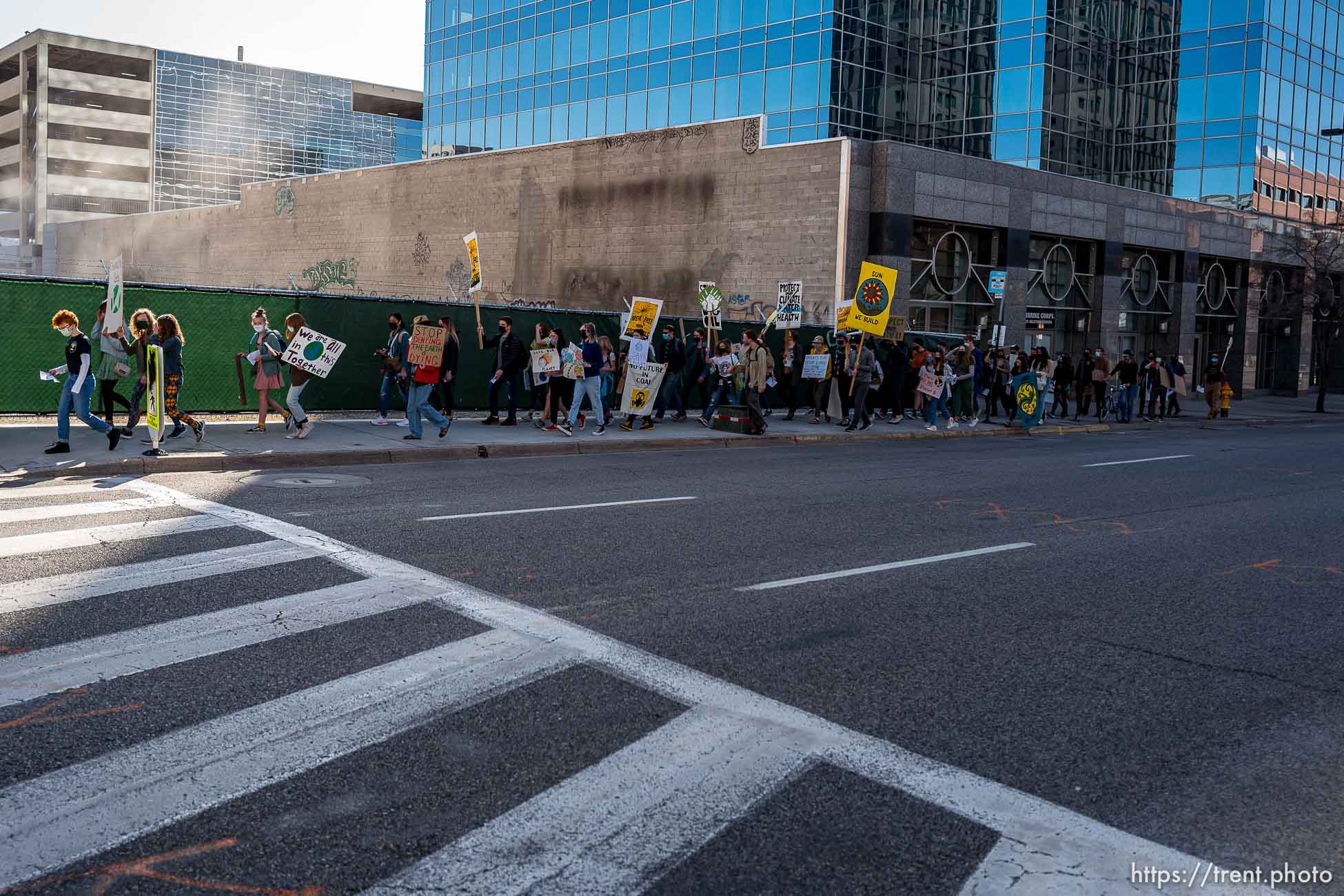 (Trent Nelson  |  The Salt Lake Tribune) Students march to the state Capitol in Salt Lake City to protest inaction on the climate crisis on Friday, March 19, 2021.