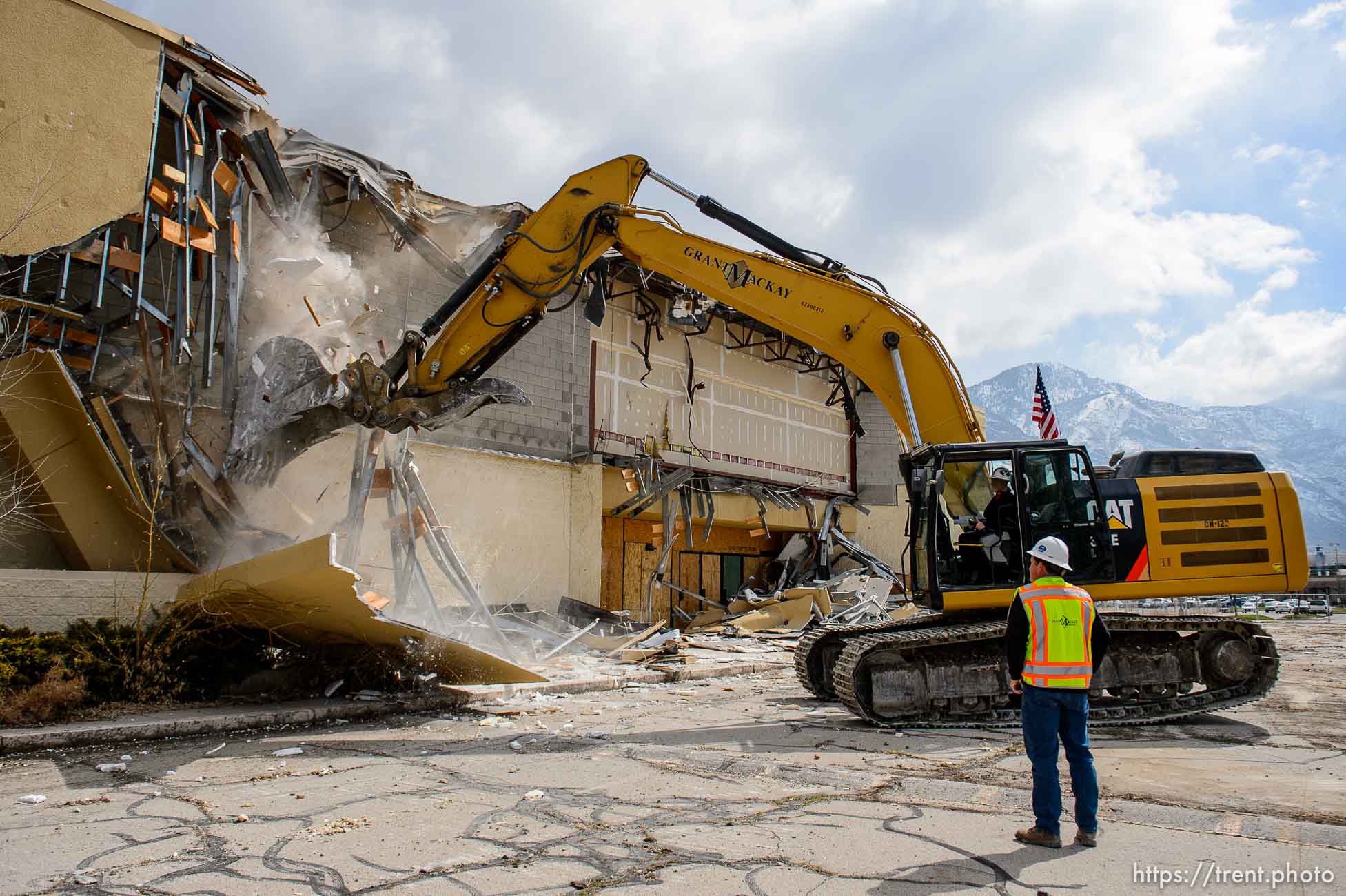 (Trent Nelson  |  The Salt Lake Tribune) Provo City Kaye Neves pulls down the face of what was a Shopko in the now-defunct Plum Tree shopping center in Provo is demolished to make way for a new development on Tuesday, March 23, 2021.