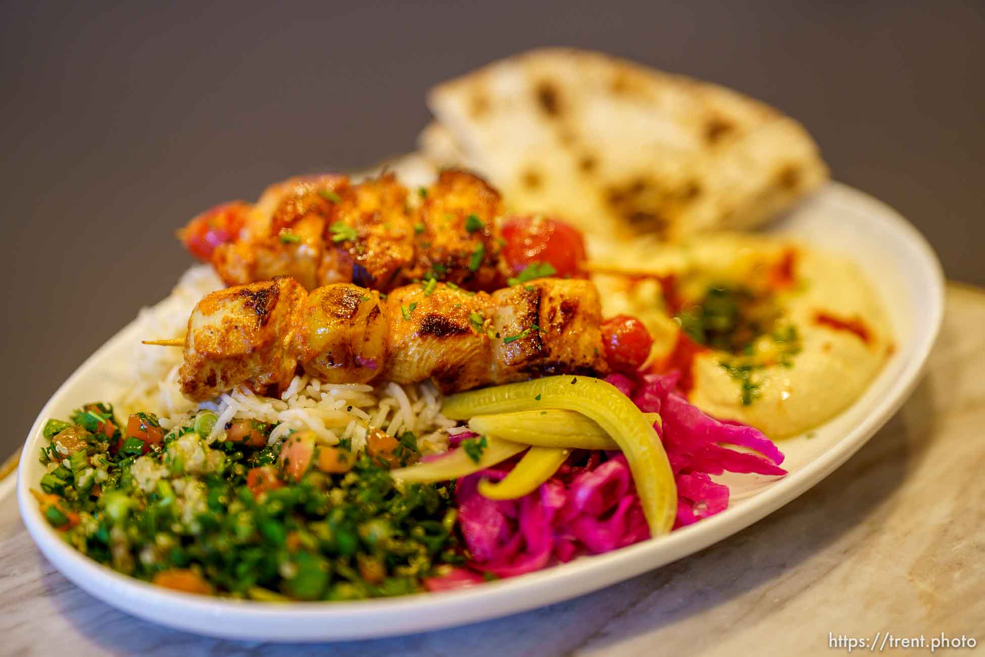 (Trent Nelson  |  The Salt Lake Tribune) The Laziz Mediterranean Platter with chicken (Tawook Skewers) Laziz Kitchen in Salt Lake City on Wednesday, March 24, 2021.