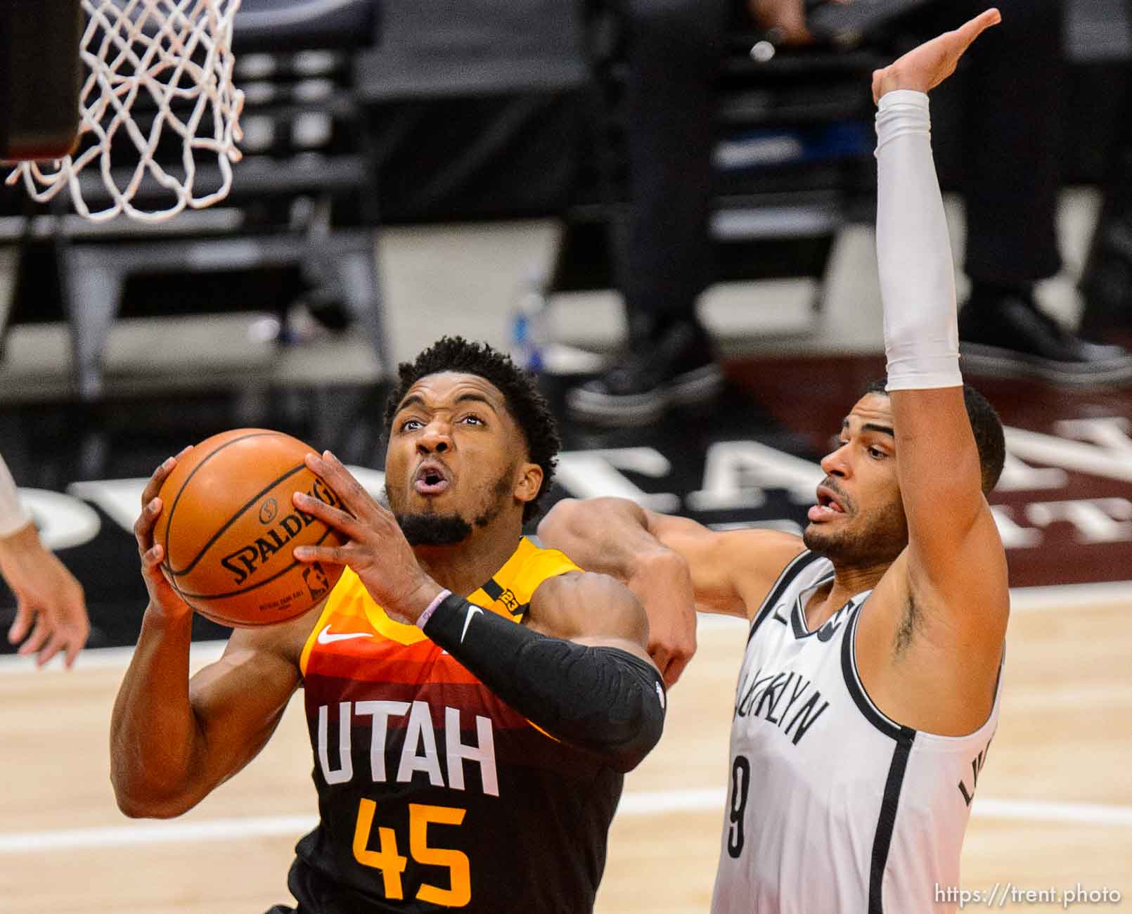 (Trent Nelson  |  The Salt Lake Tribune) Utah Jazz guard Donovan Mitchell (45) scores ahead of Brooklyn Nets guard Timothe Luwawu-Cabarrot (9) as the Utah Jazz host the Brooklyn Nets, NBA basketball in Salt Lake City on Wednesday, March 24, 2021.