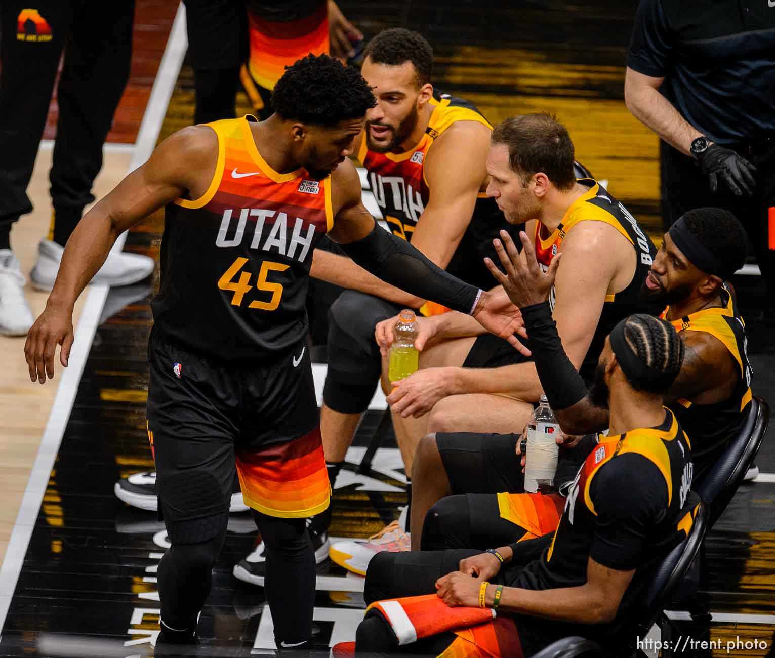 (Trent Nelson  |  The Salt Lake Tribune) Utah Jazz guard Donovan Mitchell (45) high-fives teammates as the Utah Jazz host the Brooklyn Nets, NBA basketball in Salt Lake City on Wednesday, March 24, 2021.