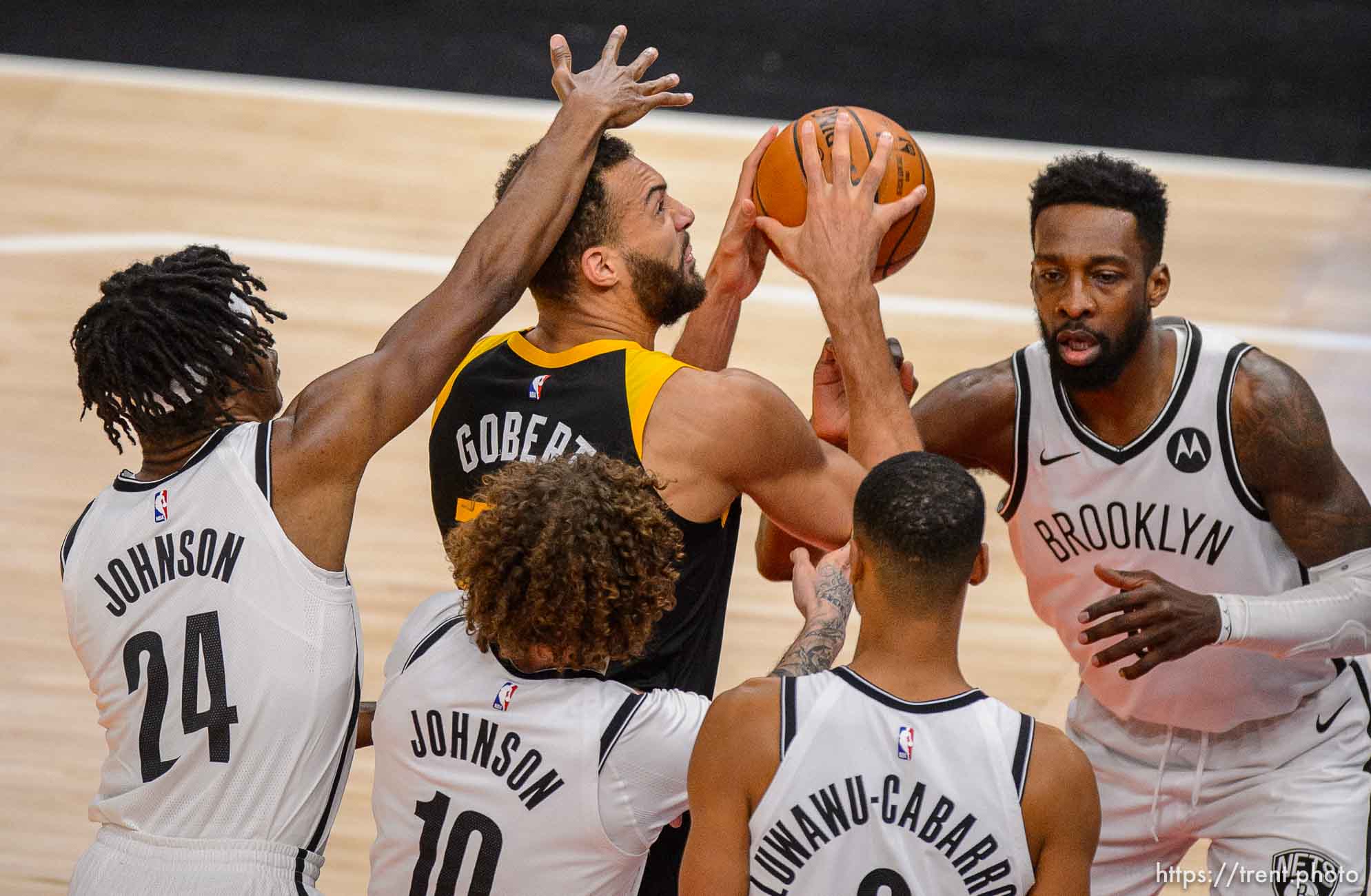 (Trent Nelson  |  The Salt Lake Tribune) Utah Jazz center Rudy Gobert (27) is surrounded by defenders as the Utah Jazz host the Brooklyn Nets, NBA basketball in Salt Lake City on Wednesday, March 24, 2021.