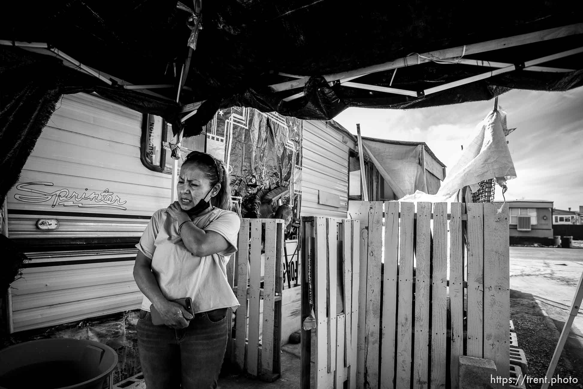 (Trent Nelson  |  The Salt Lake Tribune) July Vasquez in front of her mobile home in Riverdale on Wednesday, April 7, 2021. The property owner of the 50-unit mobile home park in Riverdale is attempting to rezone and redevelop the site. In the meantime, the landlord has raised rent by $200 a month.