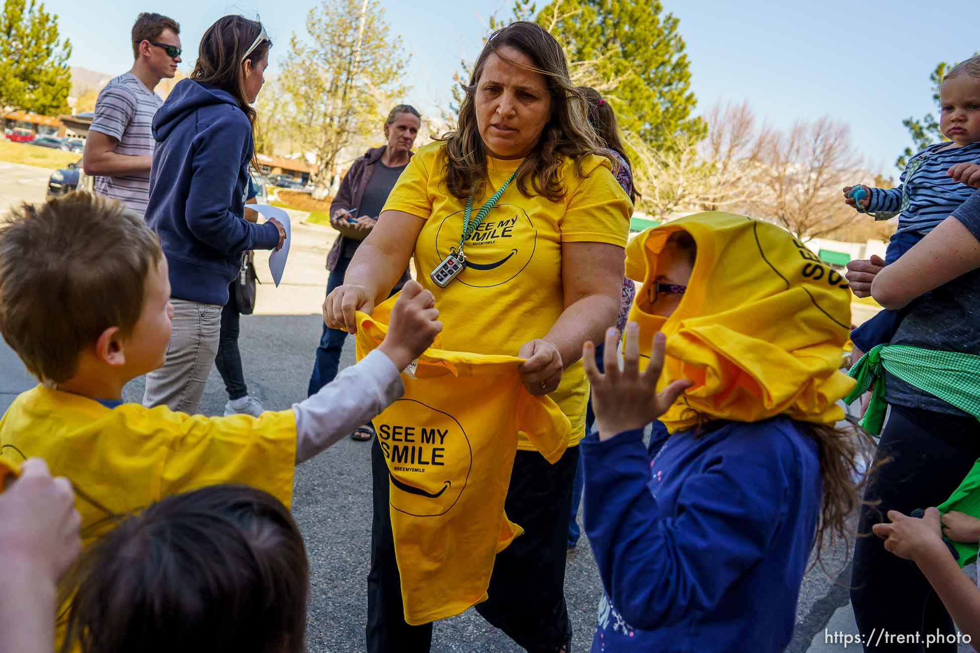 (Trent Nelson  |  The Salt Lake Tribune) Lisa Davis hands out t-shirts in front of the Granite School District offices in South Salt Lake on Saturday, April 10, 2021. Rallies were announced for all Utah school district offices by a coalition of groups opposed to mask mandates.