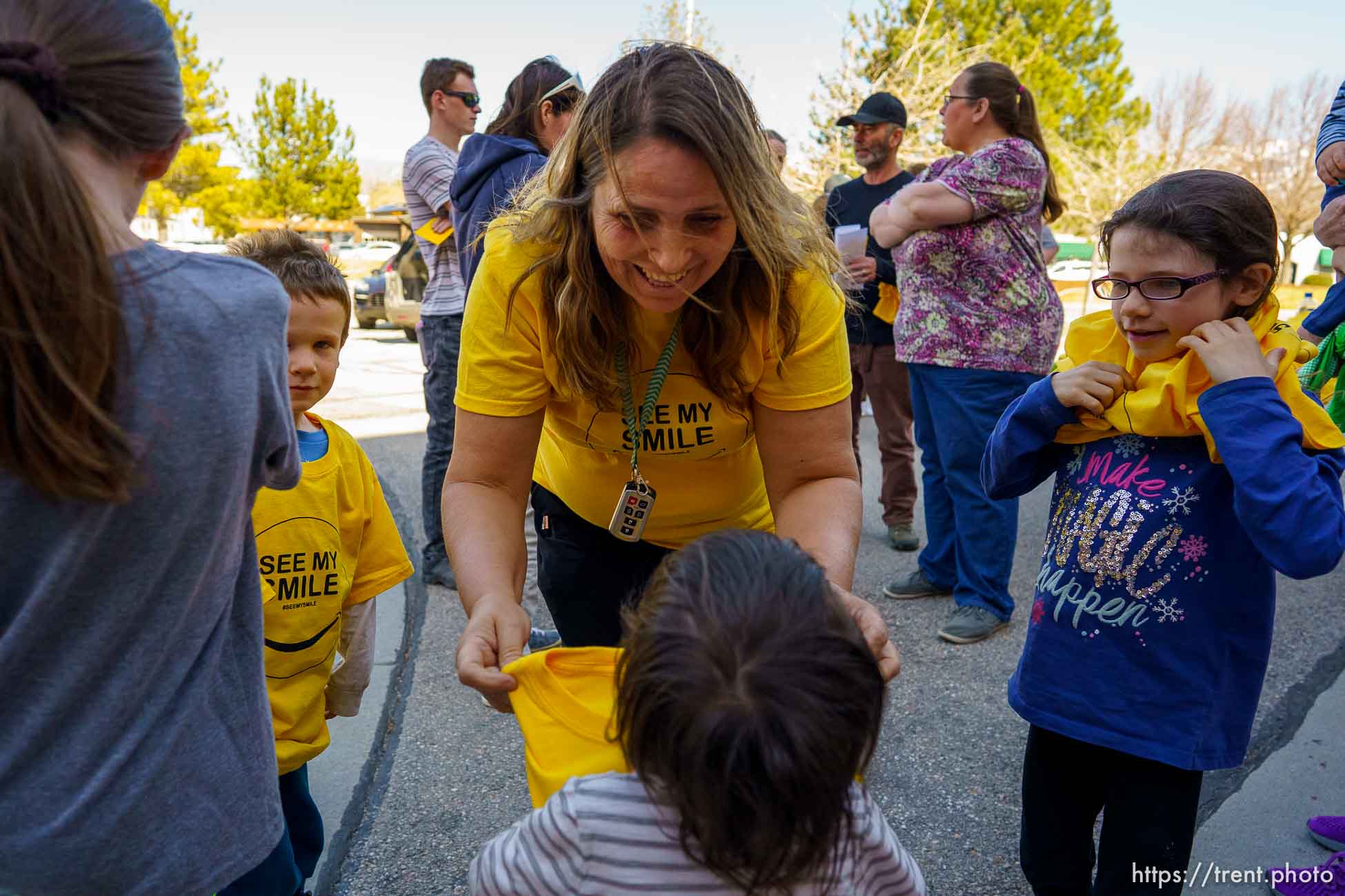 (Trent Nelson  |  The Salt Lake Tribune) Lisa Davis hands out t-shirts in front of the Granite School District offices in South Salt Lake on Saturday, April 10, 2021. Rallies were announced for all Utah school district offices by a coalition of groups opposed to mask mandates.