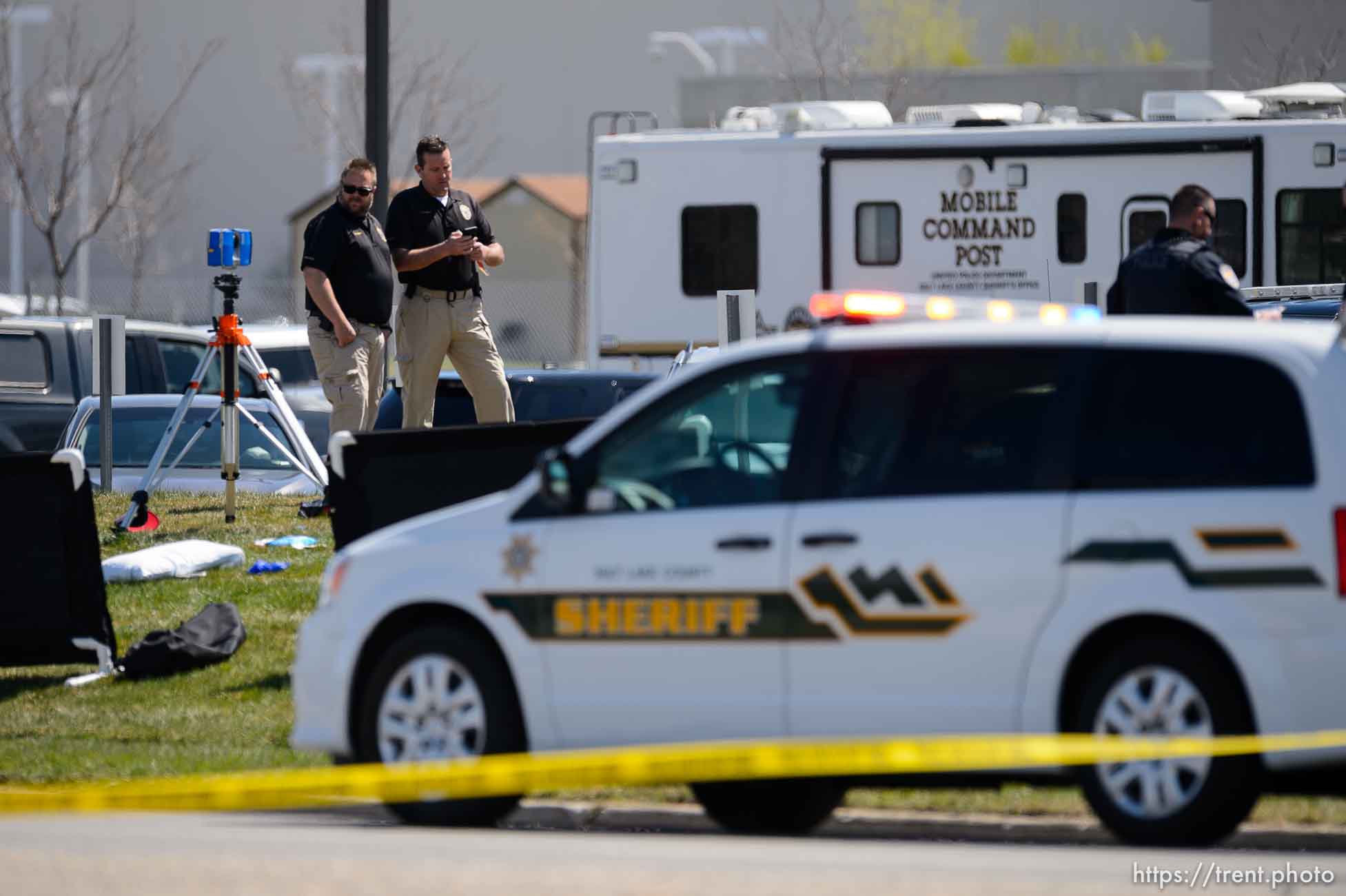 (Trent Nelson  |  The Salt Lake Tribune) Police on the scene of a shooting at the Salt Lake County Sheriff's Office in South Salt Lake on Saturday, April 10, 2021.