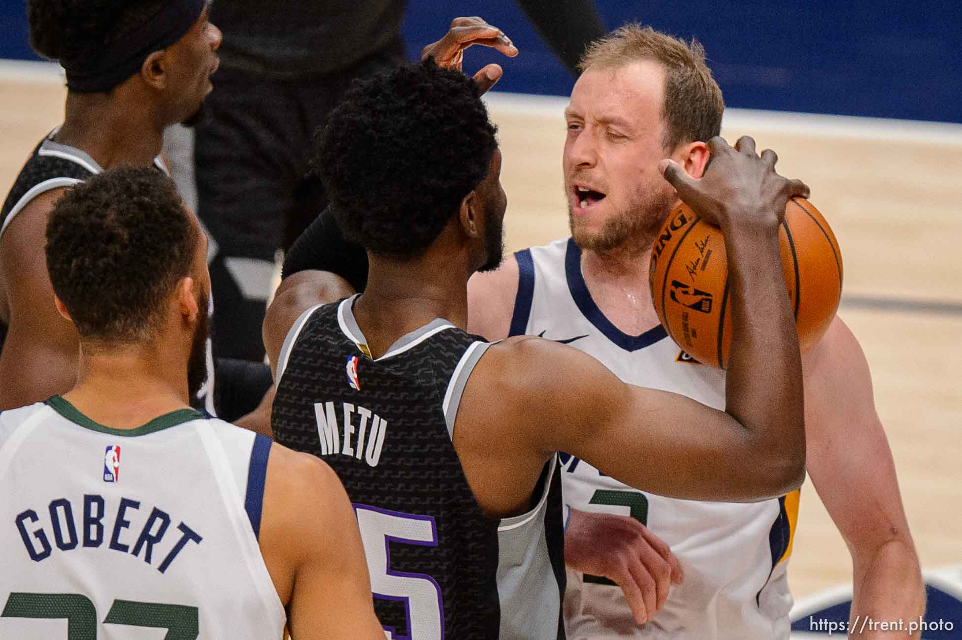 (Trent Nelson  |  The Salt Lake Tribune) Utah Jazz guard Joe Ingles (2) scores and is fouled by Sacramento Kings forward Chimezie Metu (25), as the Utah Jazz host the Sacramento Kings, NBA basketball in Salt Lake City on Saturday, April 10, 2021.