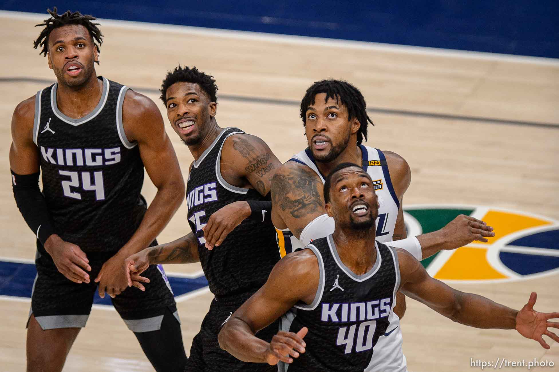 (Trent Nelson  |  The Salt Lake Tribune) Utah Jazz center Derrick Favors (15) and three Kings look for the rebound as the Utah Jazz host the Sacramento Kings, NBA basketball in Salt Lake City on Saturday, April 10, 2021.