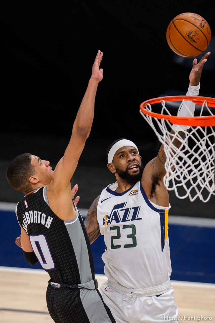 (Trent Nelson  |  The Salt Lake Tribune) Utah Jazz forward Royce O'Neale (23) scores ahead of Sacramento Kings guard Tyrese Haliburton (0) as the Utah Jazz host the Sacramento Kings, NBA basketball in Salt Lake City on Saturday, April 10, 2021.