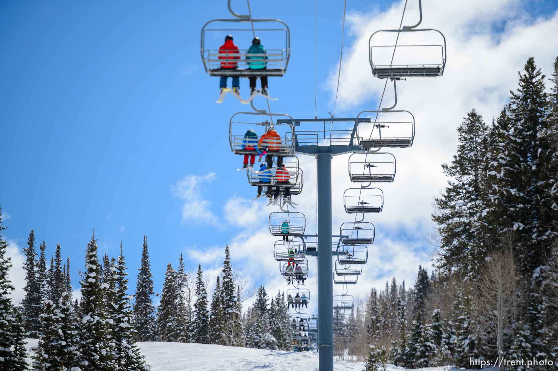 (Trent Nelson  |  The Salt Lake Tribune) Skiers ride a lift at Solitude on Saturday, April 17, 2021.