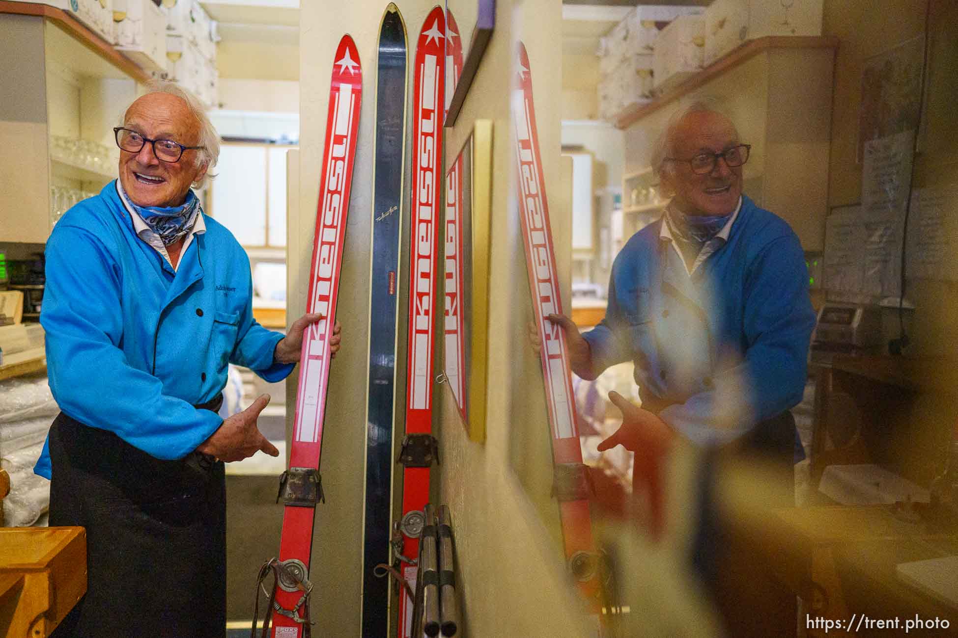 (Trent Nelson  |  The Salt Lake Tribune) Adolph Imboden at his restaurant, Adolph's Restaurant on Tuesday, April 20, 2021. Adolph's, a Park City institution and favorite of elite skiers from around the world, is closing after 47 years in business. Imboden is showing off the skis he used in his youth.