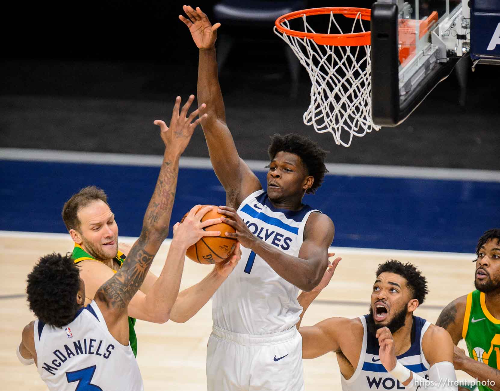 (Trent Nelson  |  The Salt Lake Tribune) Utah Jazz forward Bojan Bogdanovic (44) defended by Minnesota Timberwolves forward Jaden McDaniels (3), Minnesota Timberwolves forward Anthony Edwards (1), and Minnesota Timberwolves center Karl-Anthony Towns (32) as the Utah Jazz host the Minnesota Timberwolves, NBA basketball in Salt Lake City on Saturday, April 24, 2021.