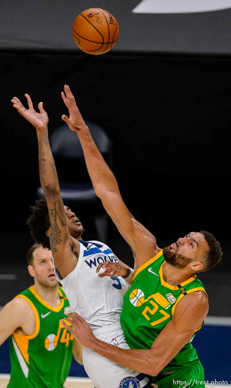 (Trent Nelson  |  The Salt Lake Tribune) Minnesota Timberwolves forward Jaden McDaniels (3), Utah Jazz center Rudy Gobert (27) as the Utah Jazz host the Minnesota Timberwolves, NBA basketball in Salt Lake City on Saturday, April 24, 2021.