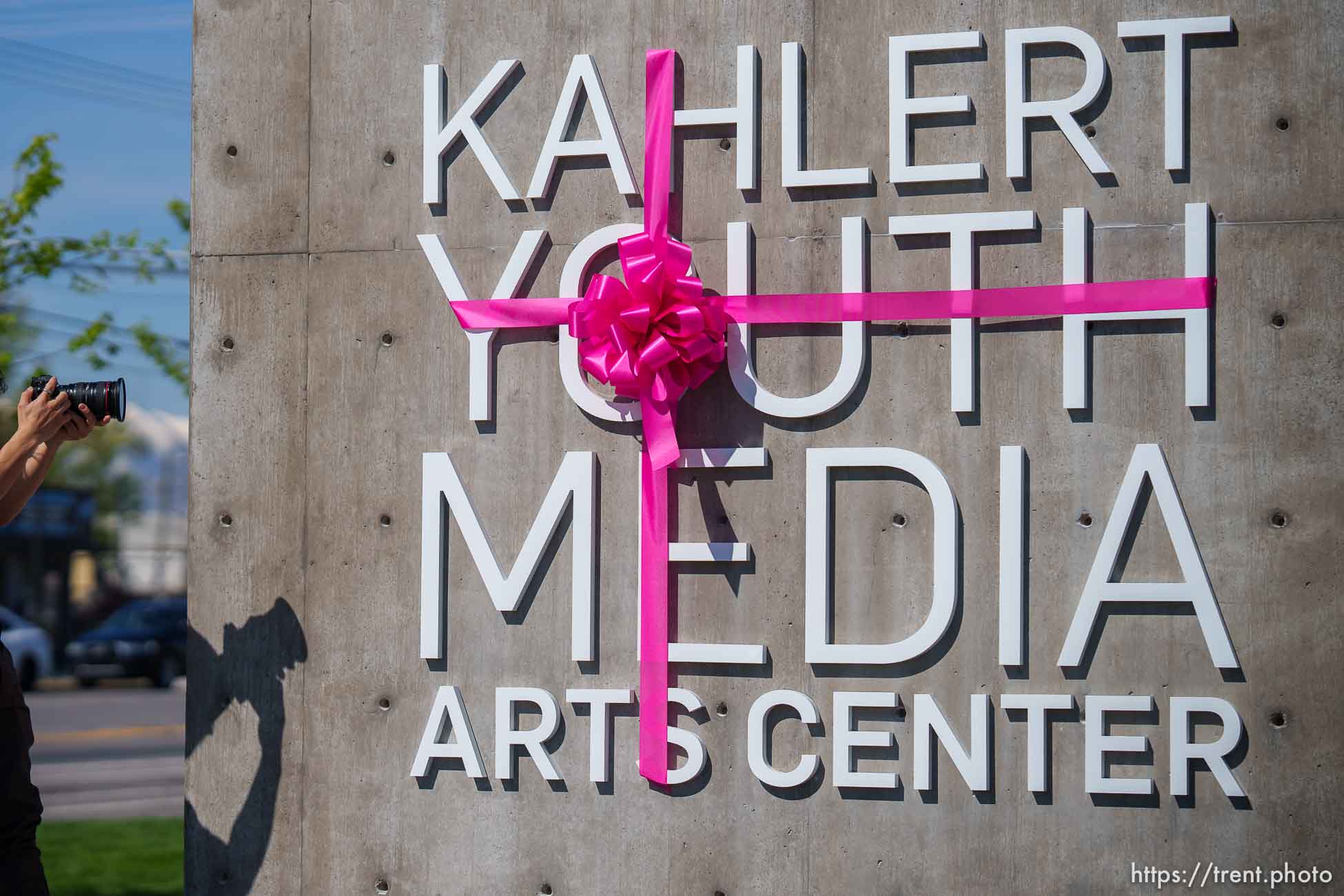 (Trent Nelson  |  The Salt Lake Tribune) Photos are taken during a dedication ceremony of Spy Hop’s new headquarters in the Central Ninth neighborhood of Salt Lake City on Wednesday, April 28, 2021.