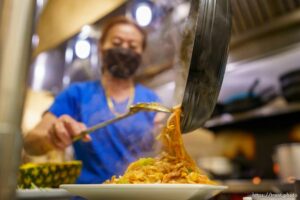 (Trent Nelson  |  The Salt Lake Tribune) Hang Nguyen cooking pad thai in the kitchen at Tuk Tuk’s in West Valley City on Monday, April 26, 2021.