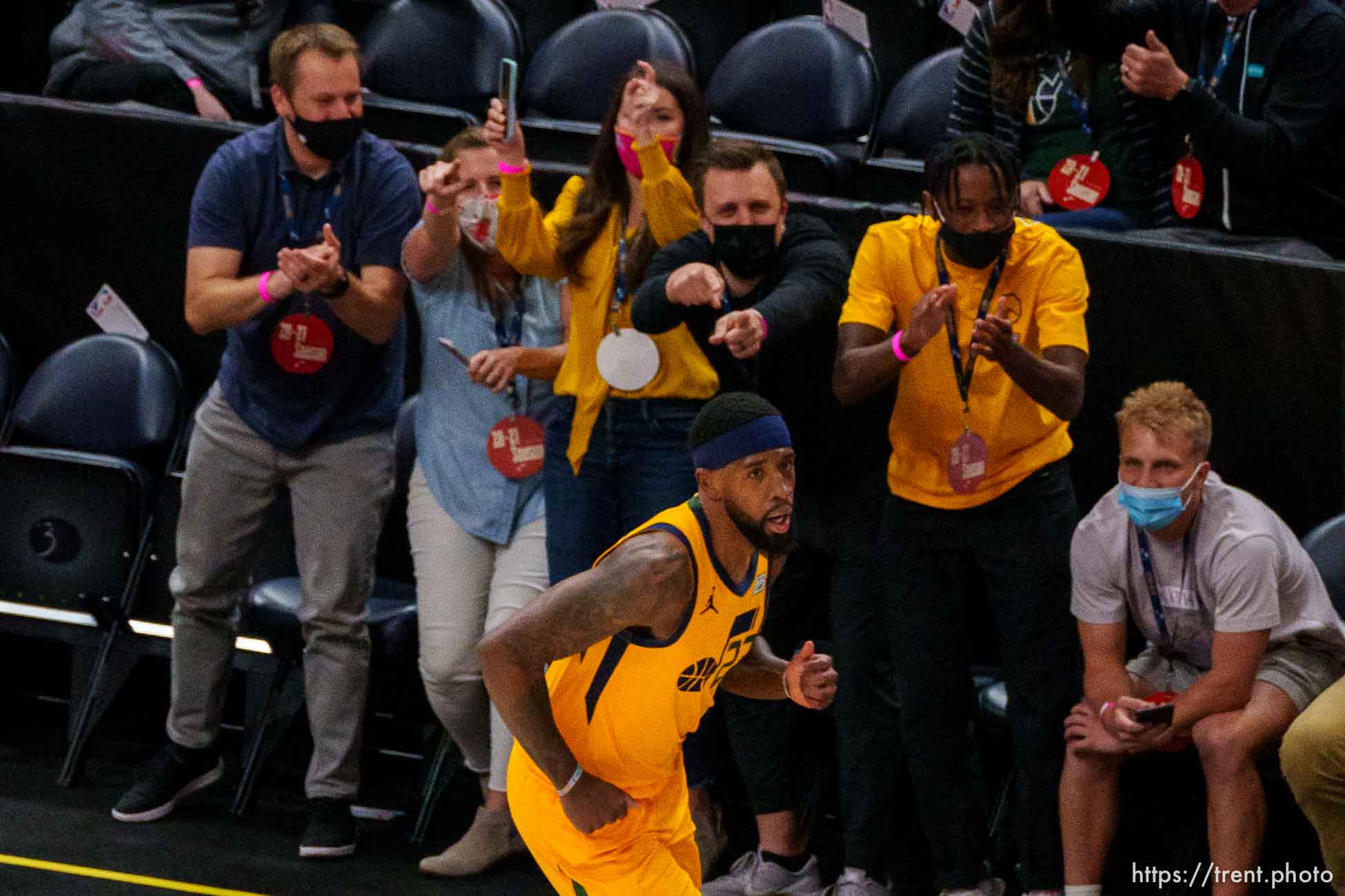 (Trent Nelson  |  The Salt Lake Tribune) Fans court side celebrate a score by Utah Jazz forward Royce O'Neale (23) as the Utah Jazz host the San Antonio Spurs, NBA basketball in Salt Lake City on Monday, May 3, 2021.