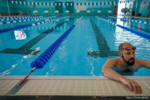 (Trent Nelson  |  The Salt Lake Tribune) Ron Tate catches his breath after swimming laps at the Draper Recreation Center on Monday, May 10, 2021. Masks are not required in the facility when exercising.