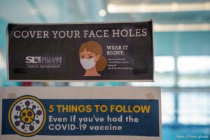 (Trent Nelson  |  The Salt Lake Tribune) A sign calls for masks to be worn at the Draper Recreation Center on Monday, May 10, 2021.