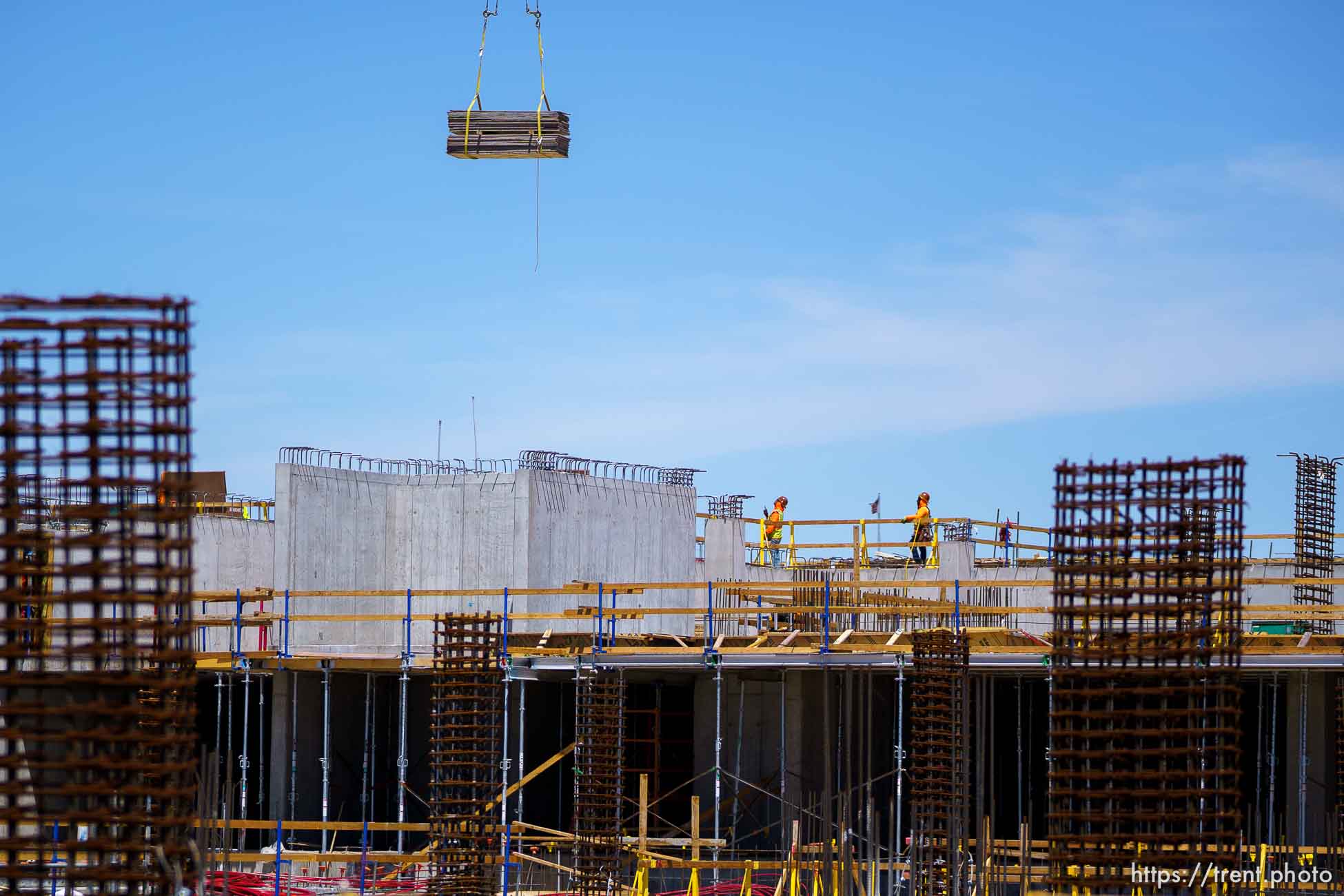 (Trent Nelson  |  The Salt Lake Tribune) Workers at the Post District development in Salt Lake City on Wednesday, May 12, 2021.