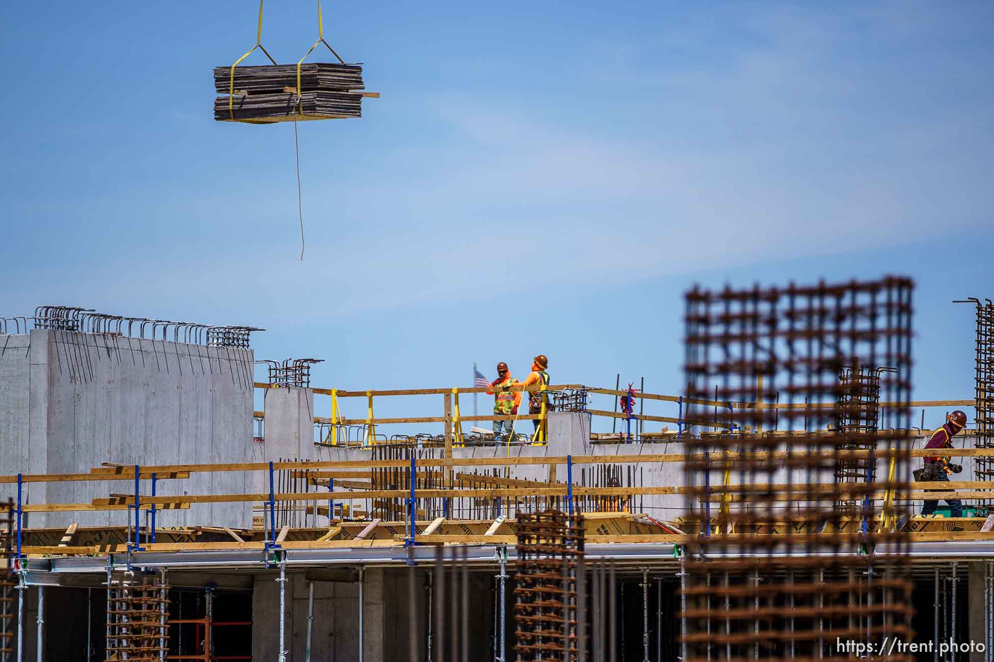 (Trent Nelson  |  The Salt Lake Tribune) Workers at the Post District development in Salt Lake City on Wednesday, May 12, 2021.