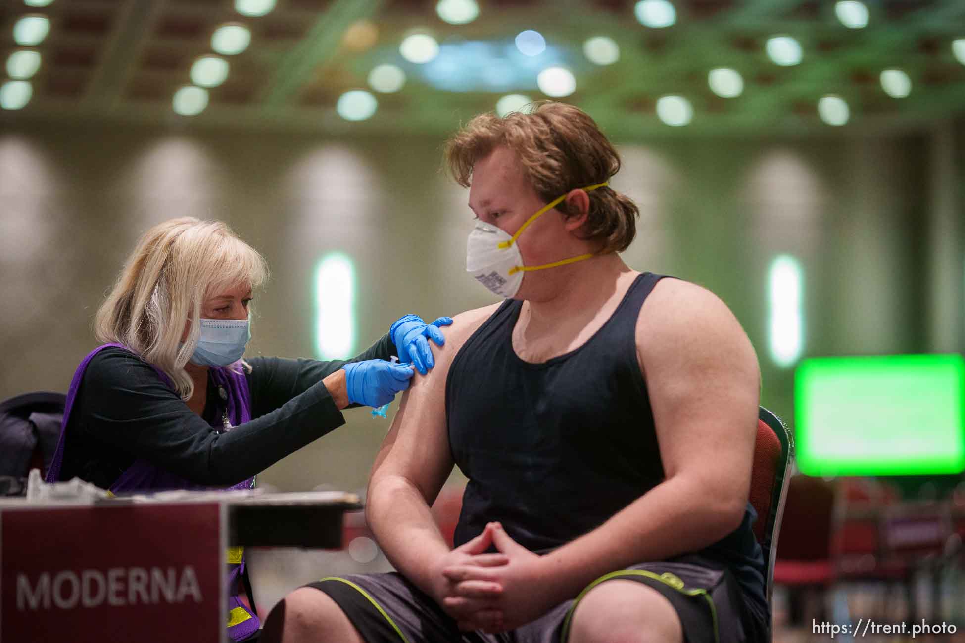 (Trent Nelson  |  The Salt Lake Tribune) Janet Bitner vaccinates Jeffrey Hesterman on the last day the Salt Lake County Health Department's COVID-19 vaccine operation was open at the Salt Palace Convention Center in Salt Lake City, Saturday, May 29, 2021.