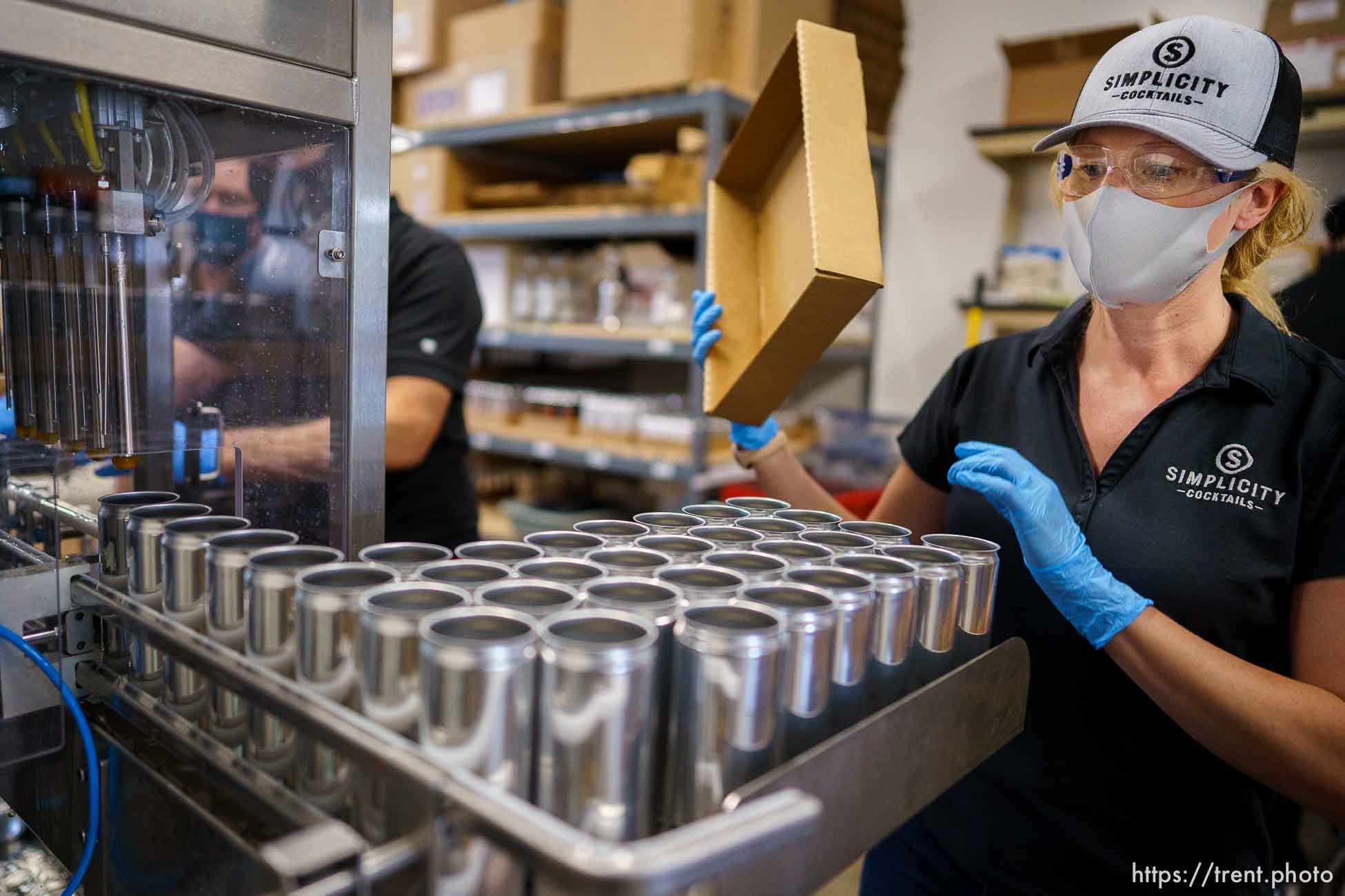 (Trent Nelson  |  The Salt Lake Tribune) Rebecca Weed working the line canning cocktails at Simplicity Canned Cocktails in Salt Lake City on Monday, May 17, 2021.