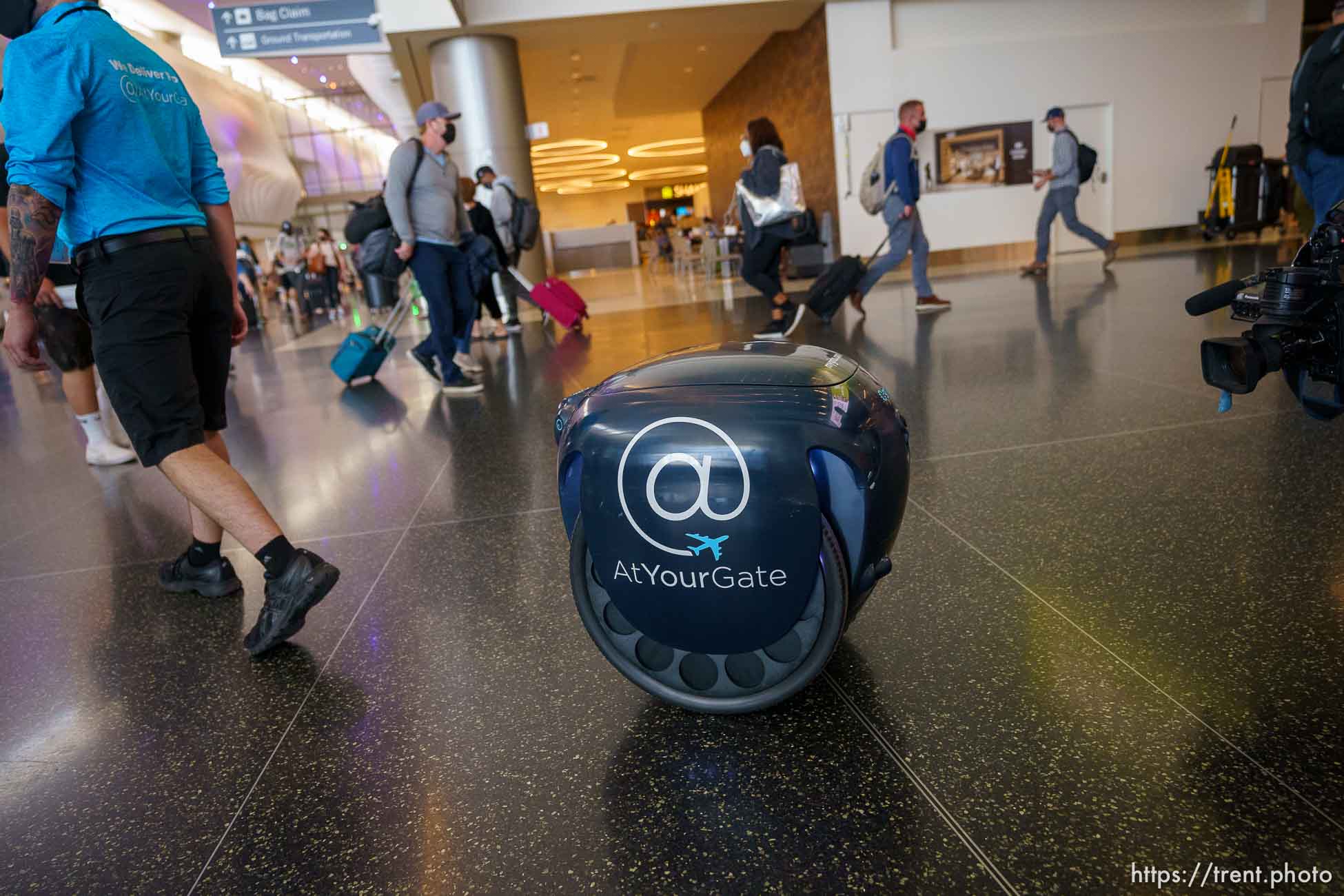 (Trent Nelson  |  The Salt Lake Tribune) A mobile food delivery robot rolls through the terminal at Salt Lake City International Airport on Monday, May 24, 2021. Servy is launching SLCtoGo, a contactless food ordering, pay, and delivery service at the airport.