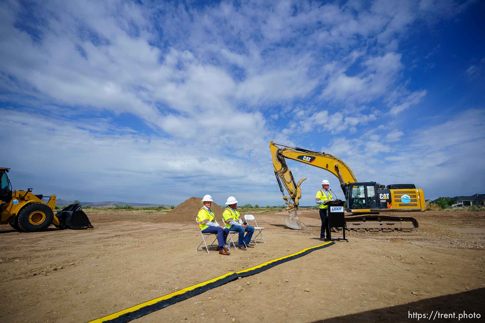 (Trent Nelson  |  The Salt Lake Tribune) Carlos Braceras, Utah Department of Transportation executive director, speaks as UDOT kicks off construction of the West Davis Highway with an event in Layton on Tuesday, May 25, 2021. At left are Senate President Stuart Adams, R-Layton, and Rep. Mike Schultz, R-Hooper.