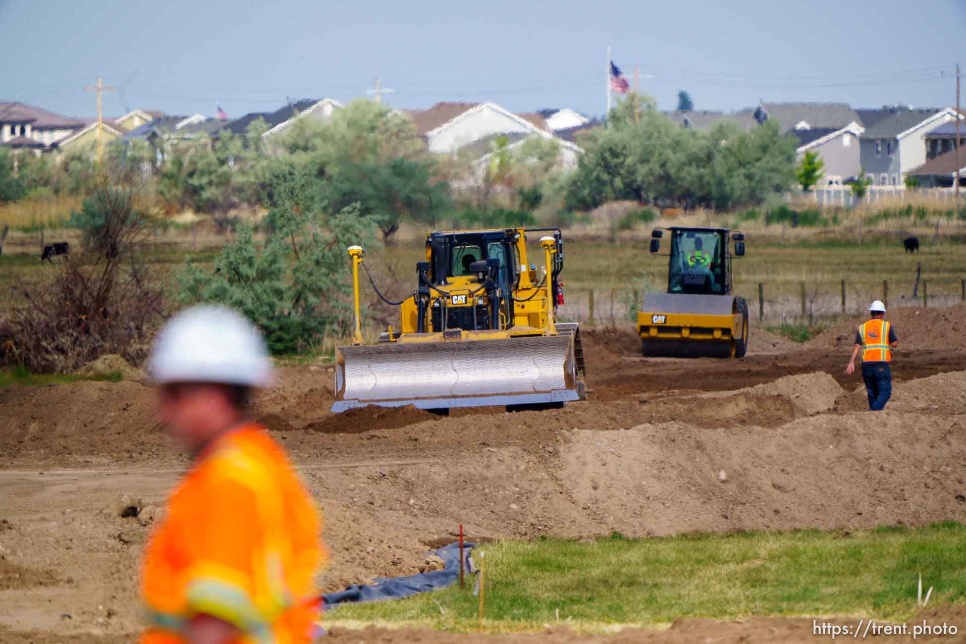 (Trent Nelson  |  The Salt Lake Tribune) Heavy equipment works on the West Davis Highway project in Layton on Tuesday, May 25, 2021.