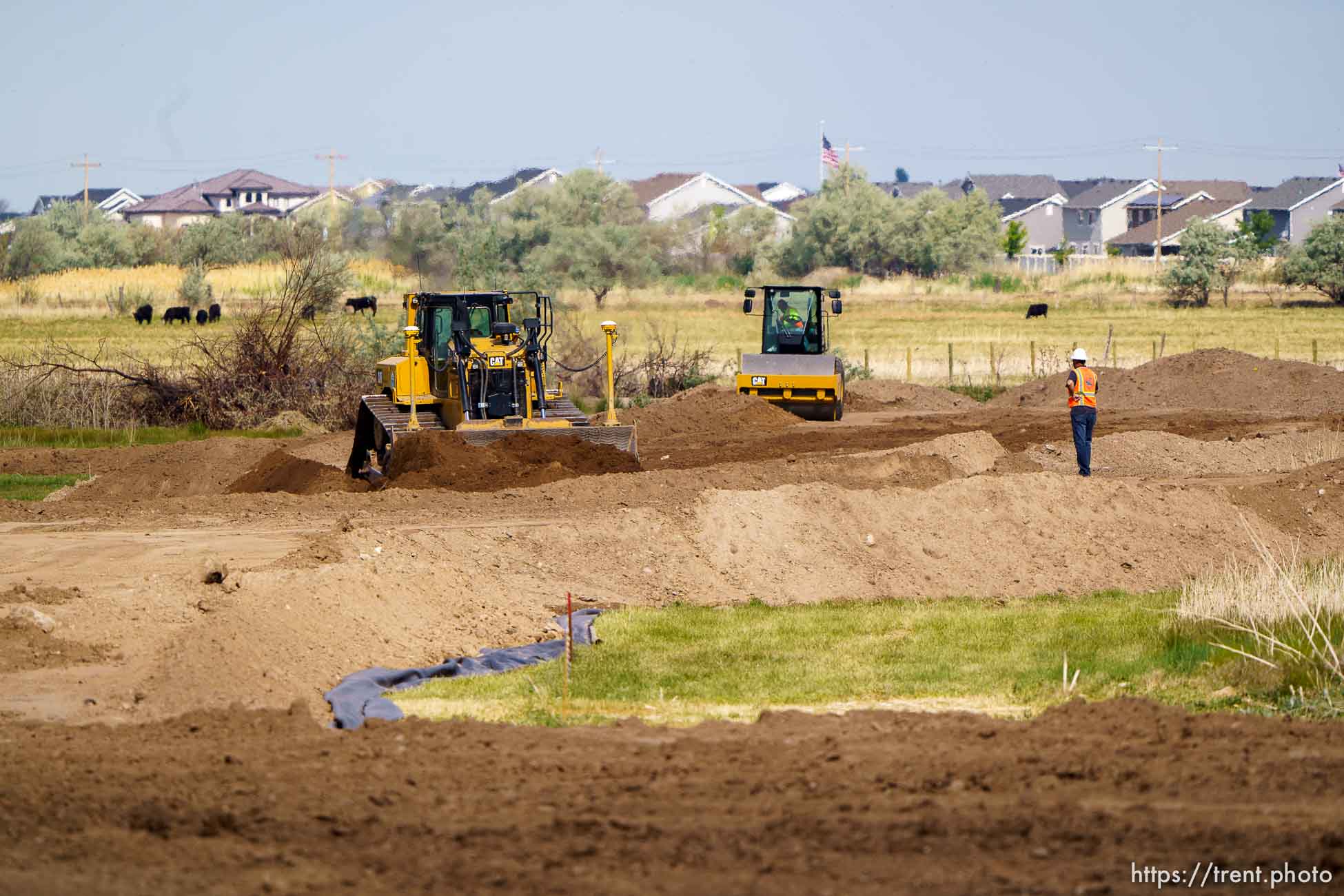 (Trent Nelson  |  The Salt Lake Tribune) Heavy equipment works on the West Davis Highway project in Layton on Tuesday, May 25, 2021.