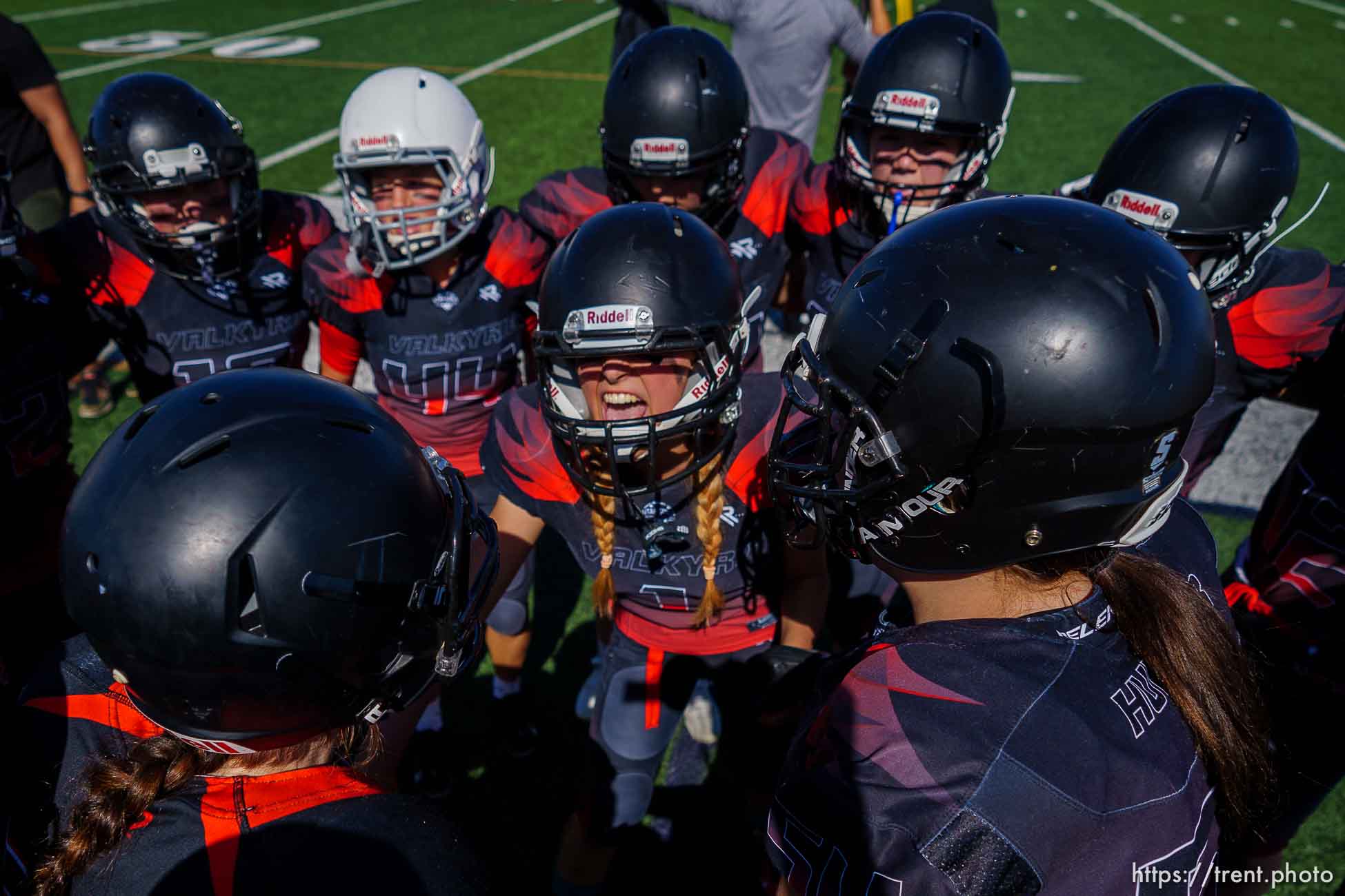 (Trent Nelson  |  The Salt Lake Tribune) The Utah Valley Valkyrie prepare to face the West Jordan Lightning in the Utah Girls Tackle Football League Division 3 championship game at Herriman High School on Thursday, May 27, 2021.