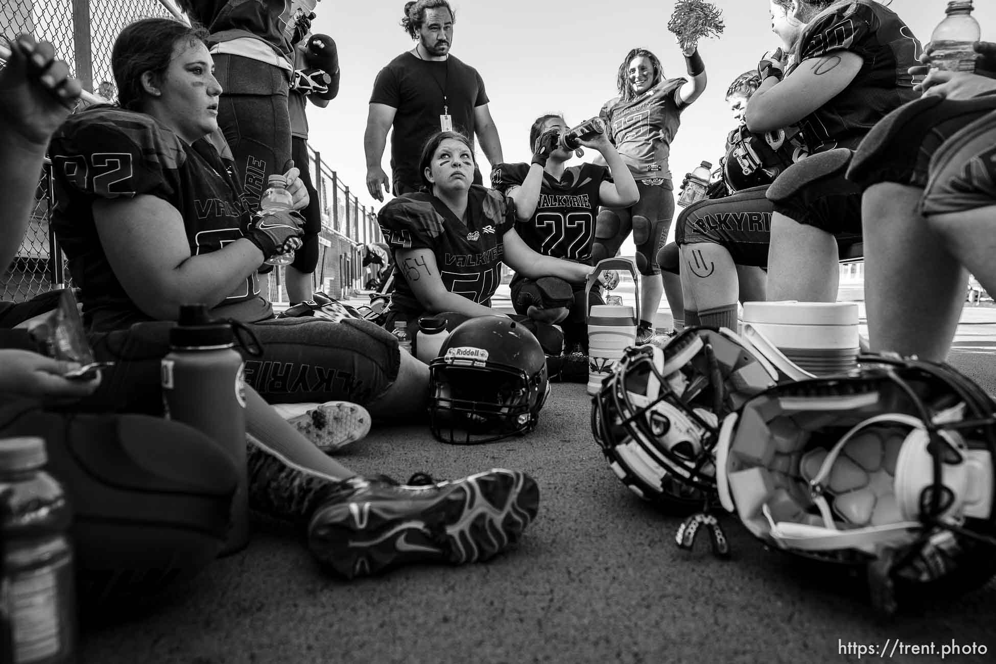 (Trent Nelson  |  The Salt Lake Tribune) The Utah Valley Valkyrie sit in the shade during halftime while facing the West Jordan Lightning in the Utah Girls Tackle Football League Division 3 championship game at Herriman High School on Thursday, May 27, 2021.