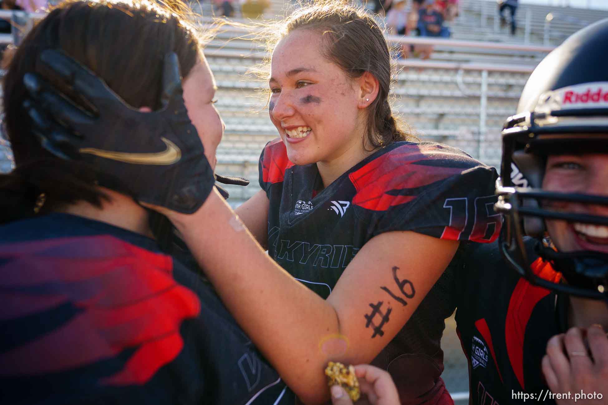 (Trent Nelson  |  The Salt Lake Tribune) Utah Valley's Ruby Canlas (16) and Brinley Hunter during halftime as the Utah Valley Valkyrie face the West Jordan Lightning in the Utah Girls Tackle Football League Division 3 championship game at Herriman High School on Thursday, May 27, 2021.