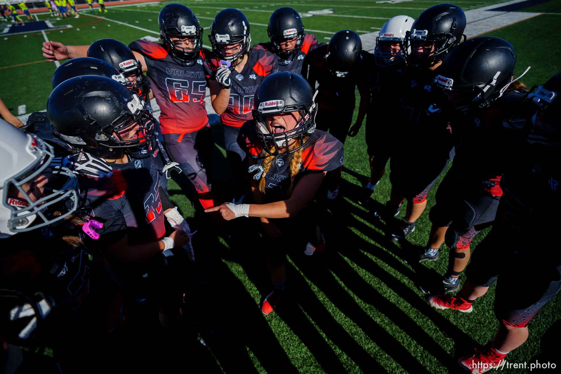 (Trent Nelson  |  The Salt Lake Tribune) The Utah Valley Valkyrie prepare to face the West Jordan Lightning in the Utah Girls Tackle Football League Division 3 championship game at Herriman High School on Thursday, May 27, 2021.