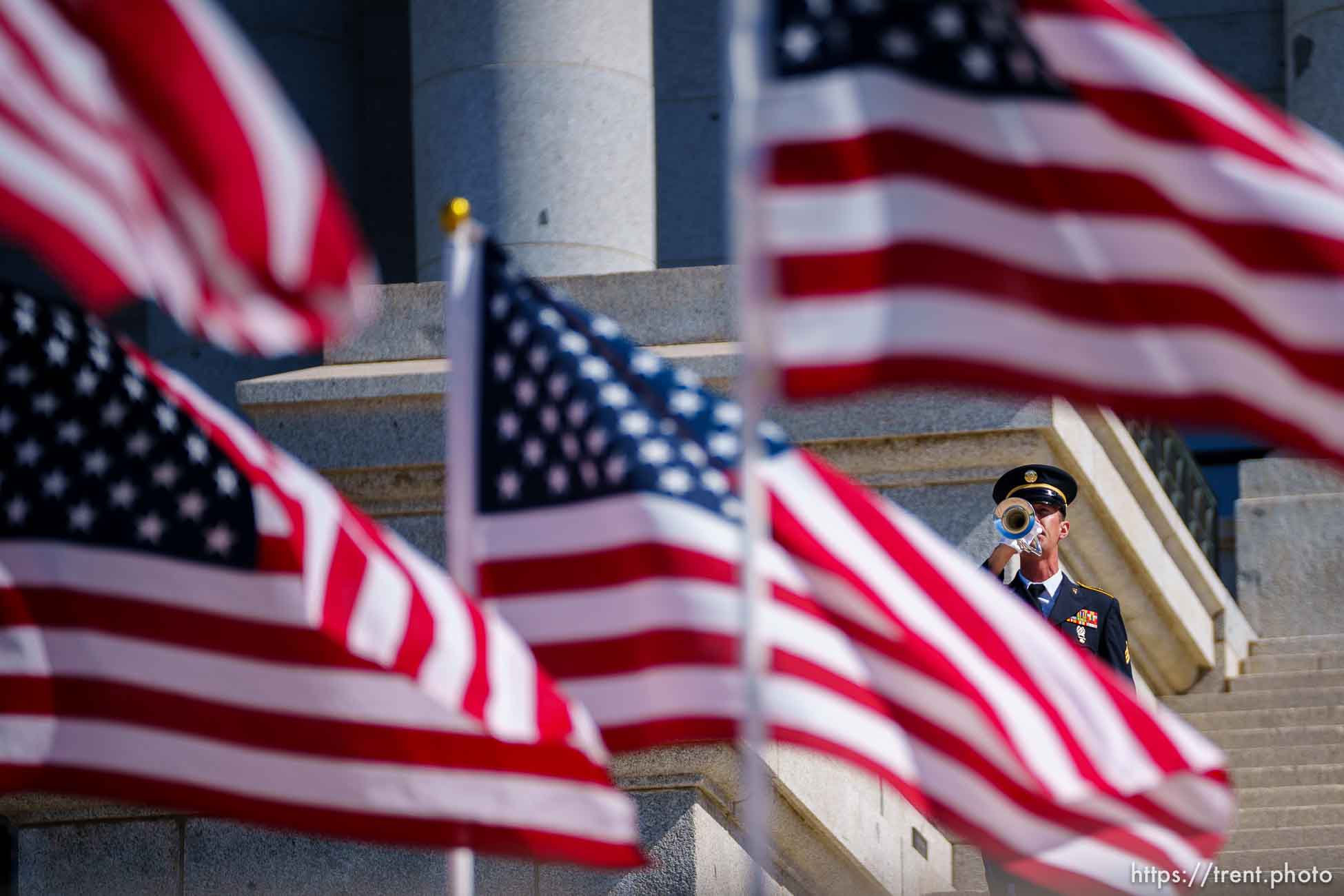 i(Trent Nelson  |  The Salt Lake Tribune) Sgt. Aaron Reynolds performs taps to honor veterans during a service at the State Capitol in Salt Lake City on Monday, May 31, 2021.