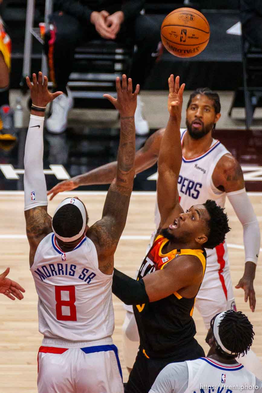 (Trent Nelson  |  The Salt Lake Tribune) Utah Jazz guard Donovan Mitchell (45) scores, bringing the score to 110-106 for Los Angeles in the final two minutes, as the Utah Jazz host the Los Angeles Clippers in a Game 5 matchup, NBA basketball in Salt Lake City on Wednesday, June 16, 2021.