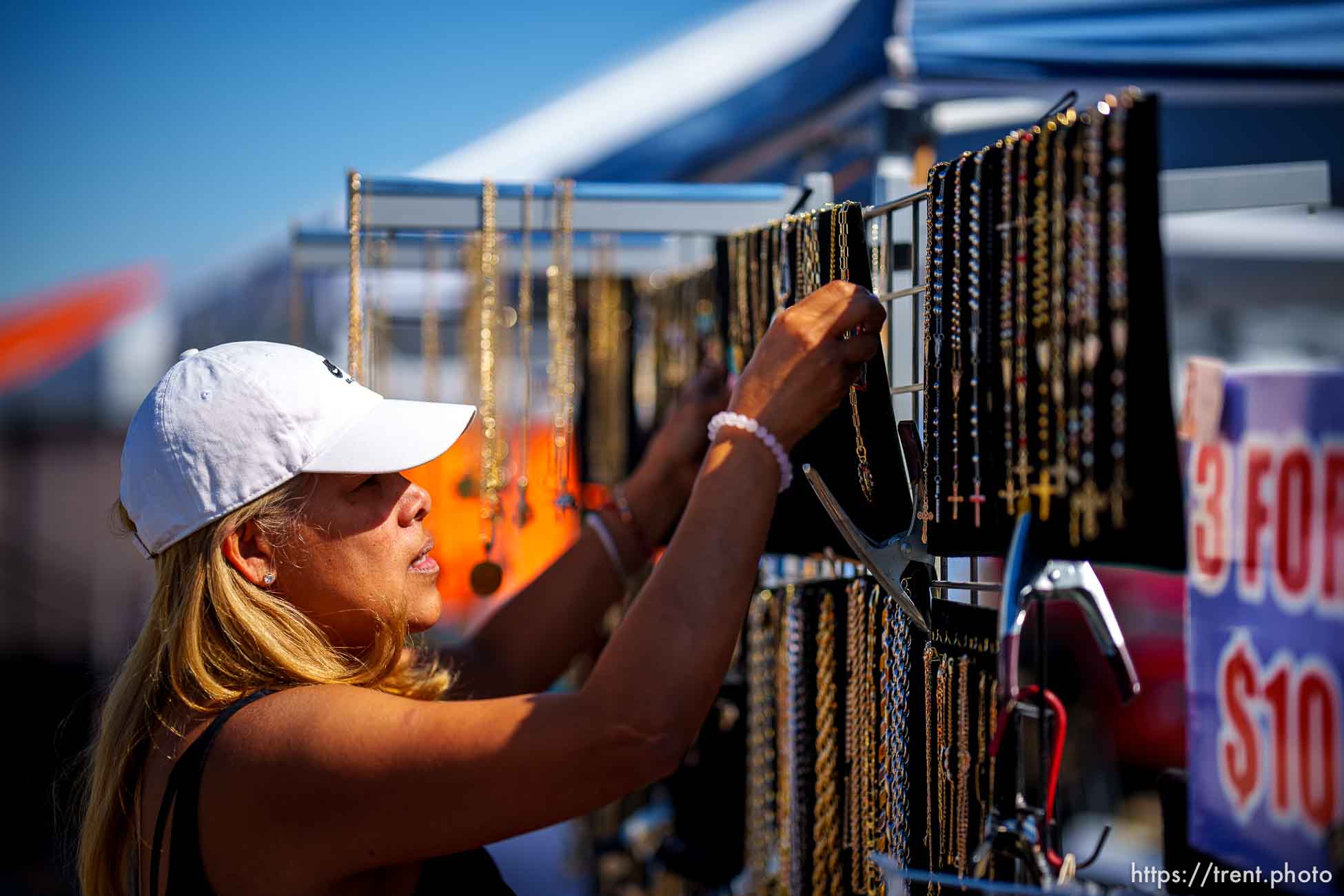 (Trent Nelson  |  The Salt Lake Tribune) Marisol Gonzalez sets out jewelry at the swap meet at the Redwood Drive In Theatre & Swap Meet in West Valley City on Saturday, June 26, 2021.