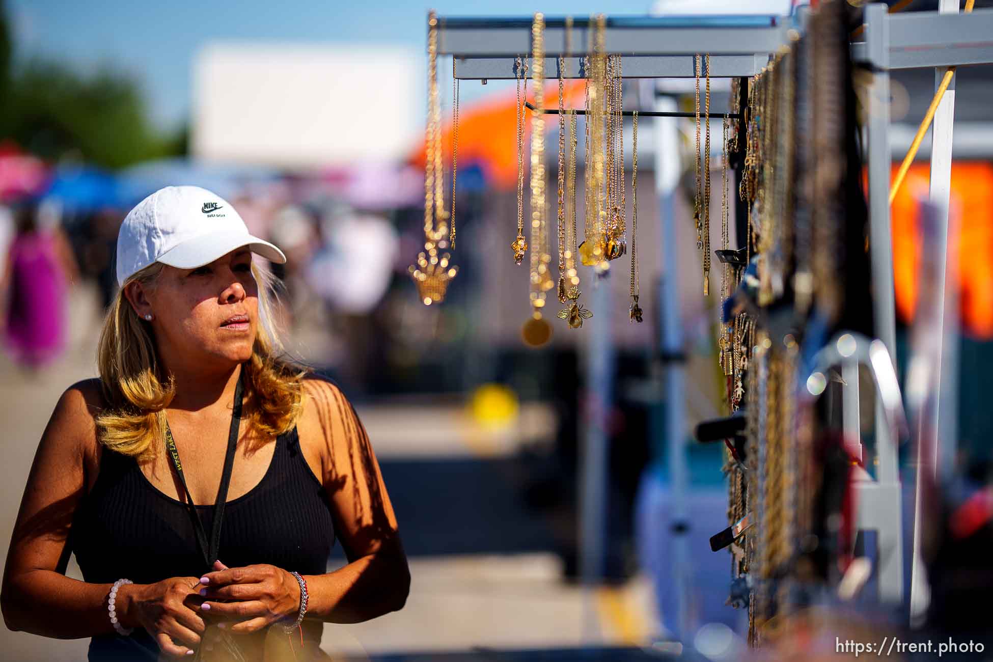 (Trent Nelson  |  The Salt Lake Tribune) Marisol Gonzalez sets out jewelry at the swap meet at the Redwood Drive In Theatre & Swap Meet in West Valley City on Saturday, June 26, 2021.