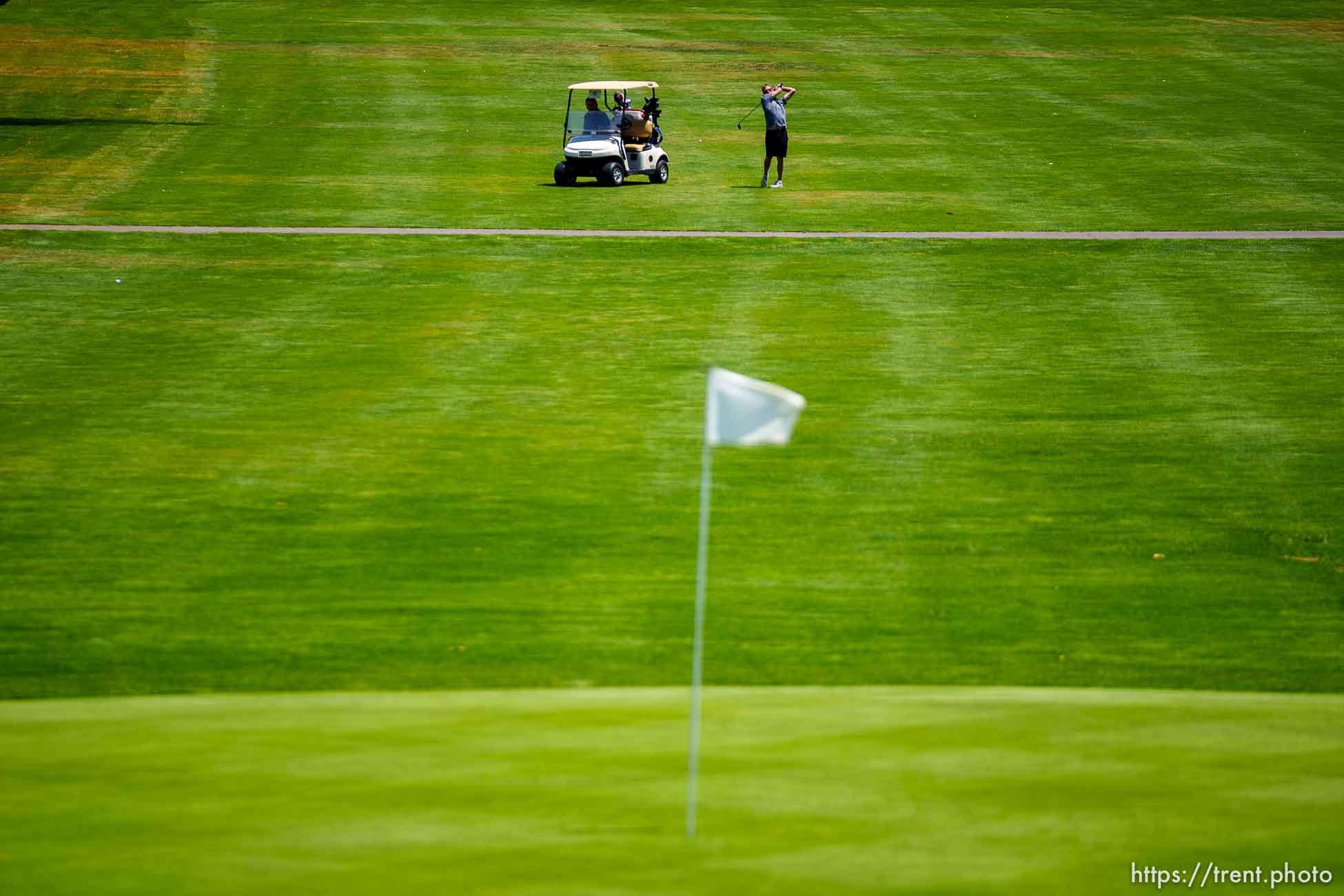 (Trent Nelson  |  The Salt Lake Tribune) Golfers at Mick Riley Golf Course in Murray on Saturday, June 26, 2021.