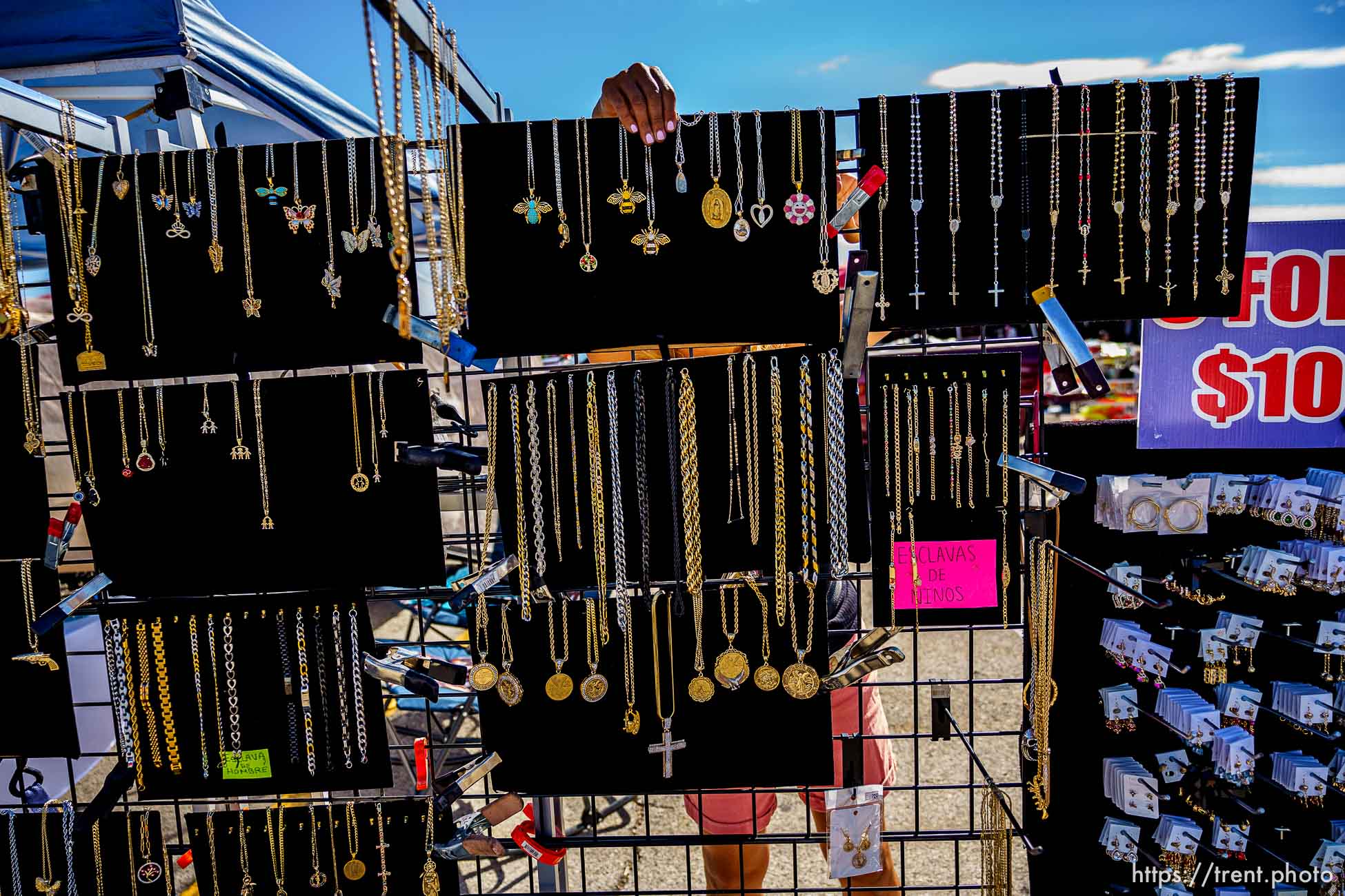 (Trent Nelson  |  The Salt Lake Tribune) Marisol Gonzalez sets out jewelry at the swap meet at the Redwood Drive In Theatre & Swap Meet in West Valley City on Saturday, June 26, 2021.